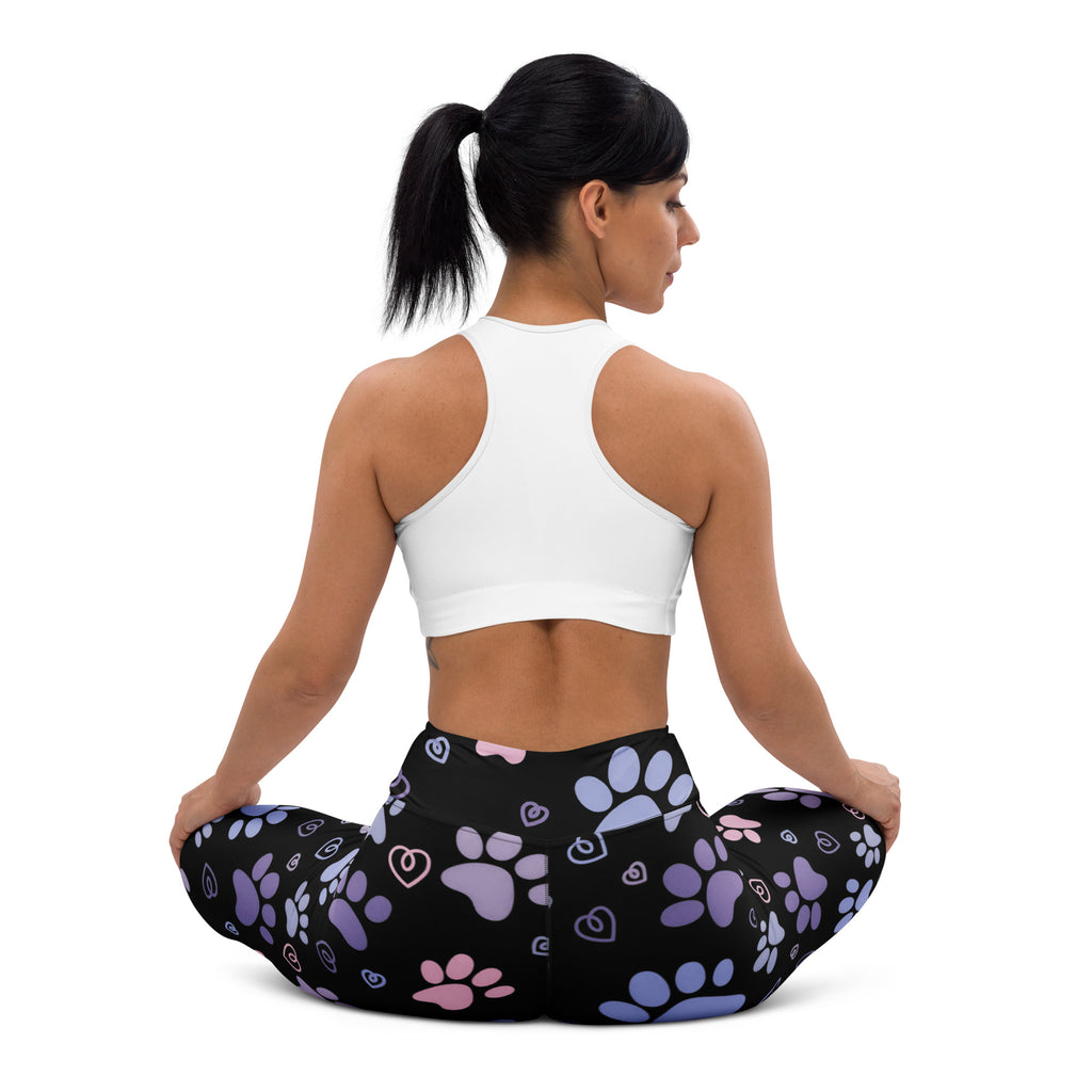 Black high-waisted buttery soft yoga leggings with playful purple and pink paw prints and hearts for women