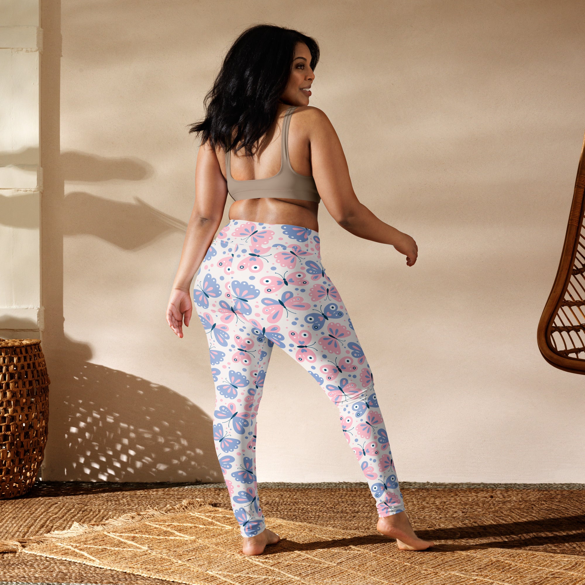 Women’s high-waisted pink and blue butterfly buttery soft yoga leggings for comfortable activewear