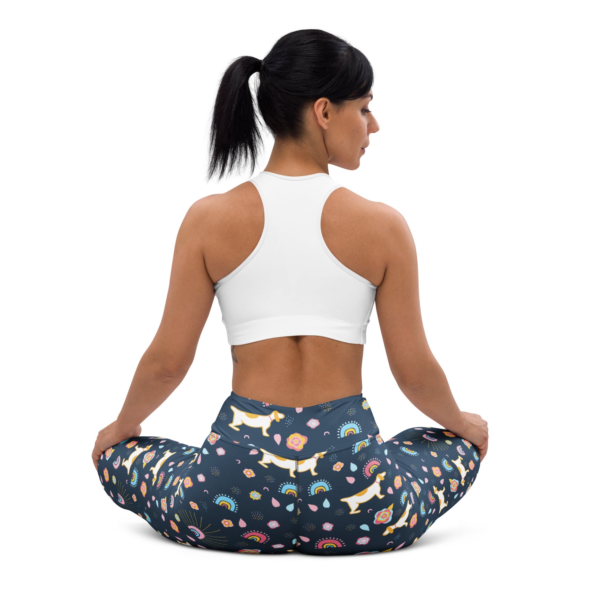 Dark blue high waisted buttery soft women’s yoga leggings with white dachshunds rainbows and pastel flowers pattern