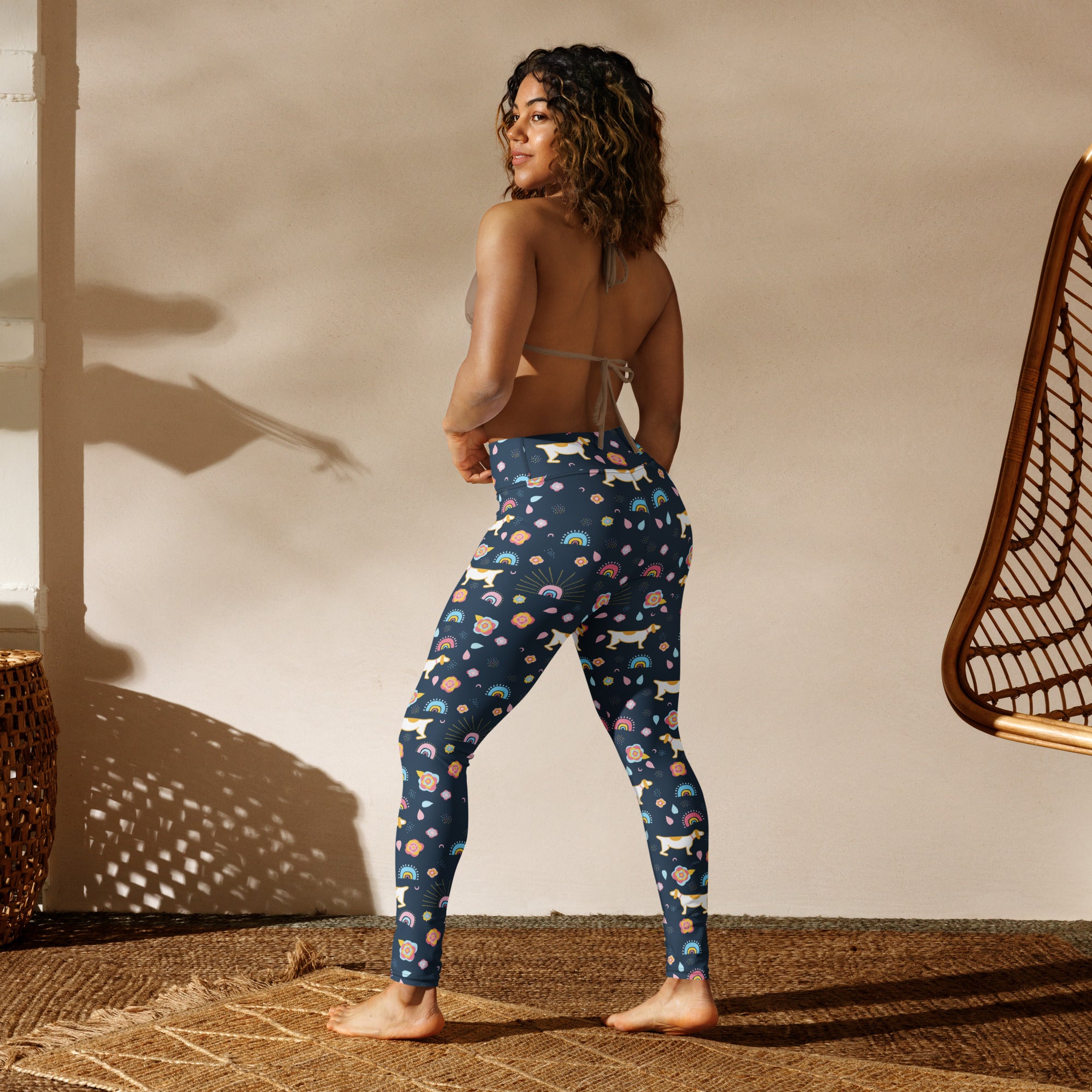 Navy blue women’s corgi themed buttery soft yoga leggings with white dogs rainbows and pastel suns pattern