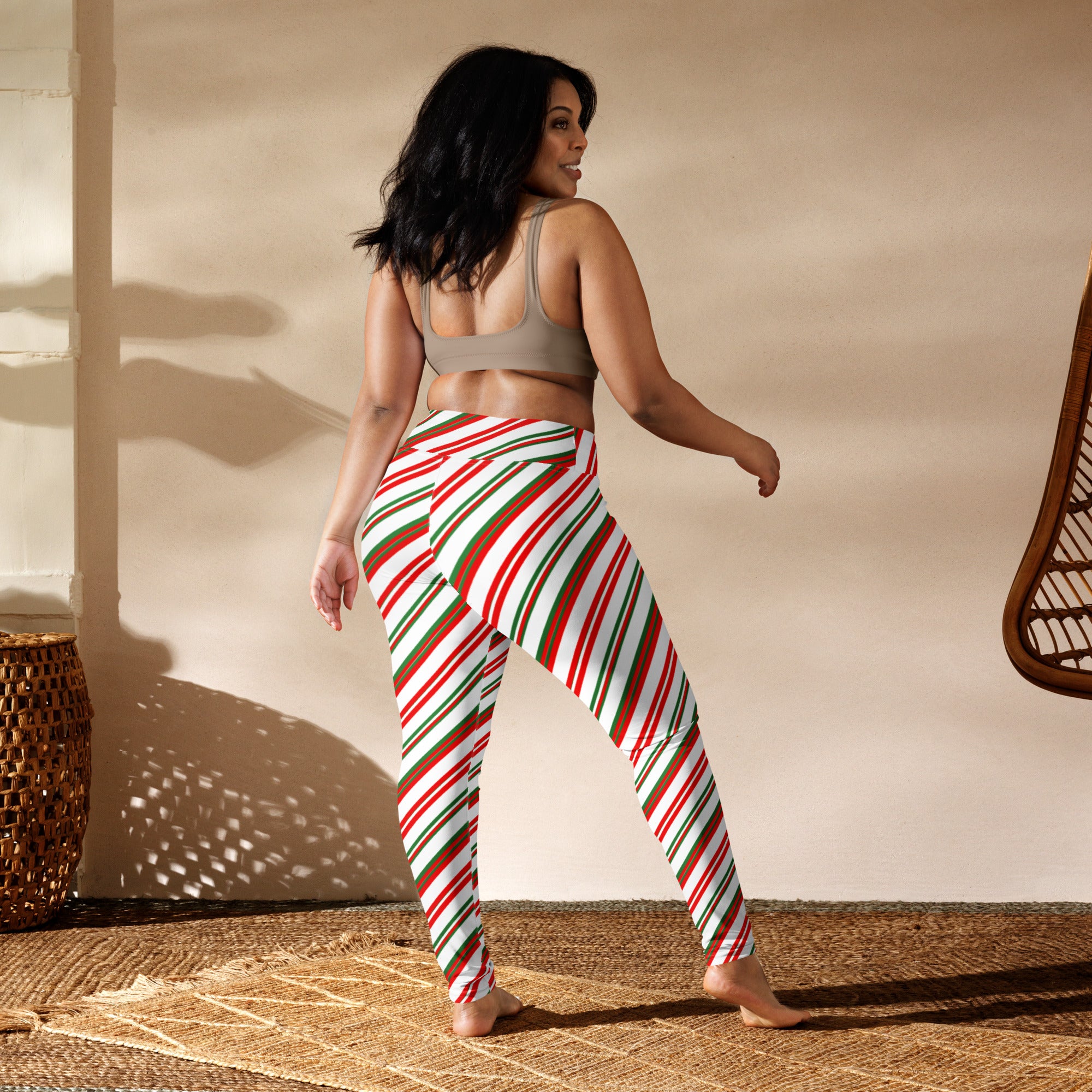 Women’s buttery soft high waisted yoga leggings with red green and white candy cane stripe pattern