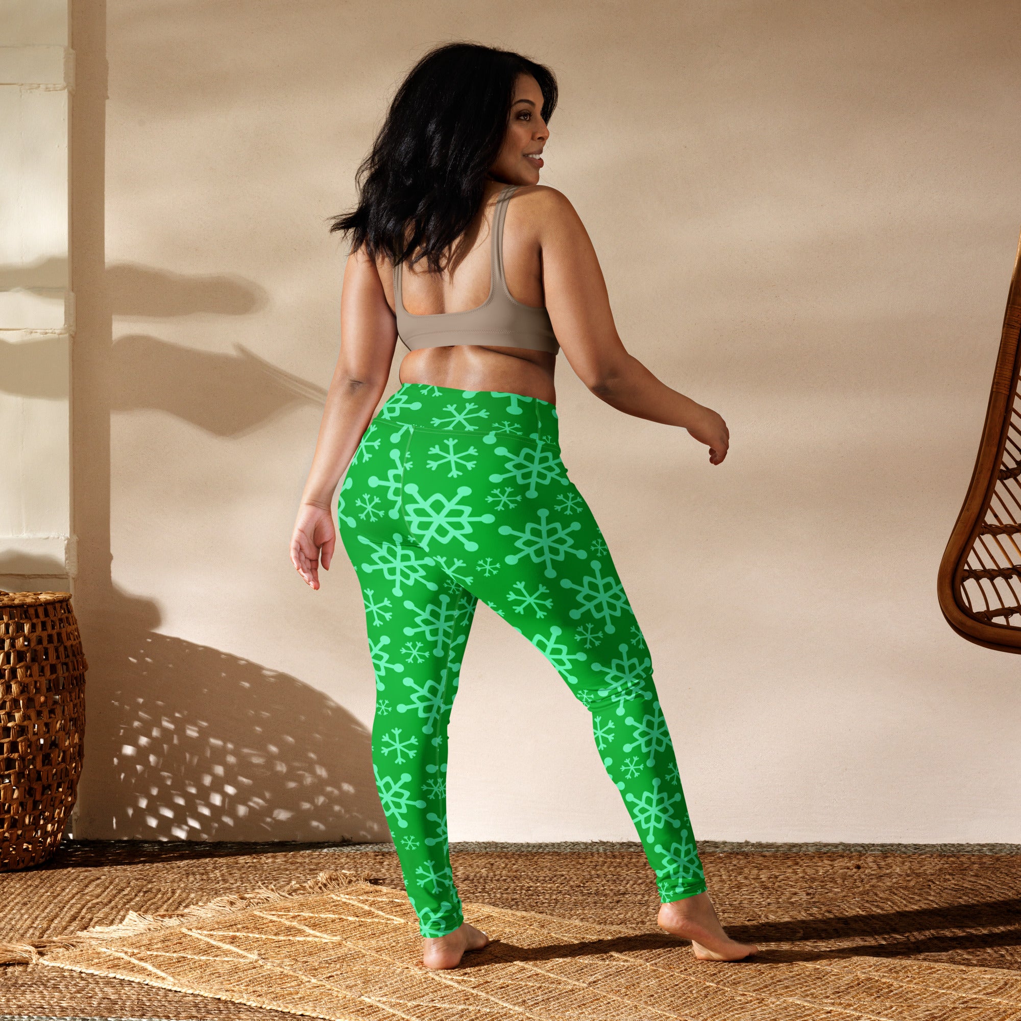 Women’s green snowflake buttery soft yoga leggings with bright green color and mint snowflake pattern