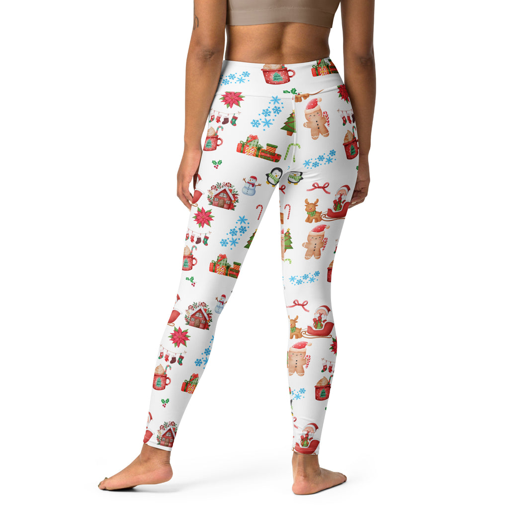 White women’s Christmas buttery soft yoga leggings with festive gingerbread men snowmen candy canes and holiday houses
