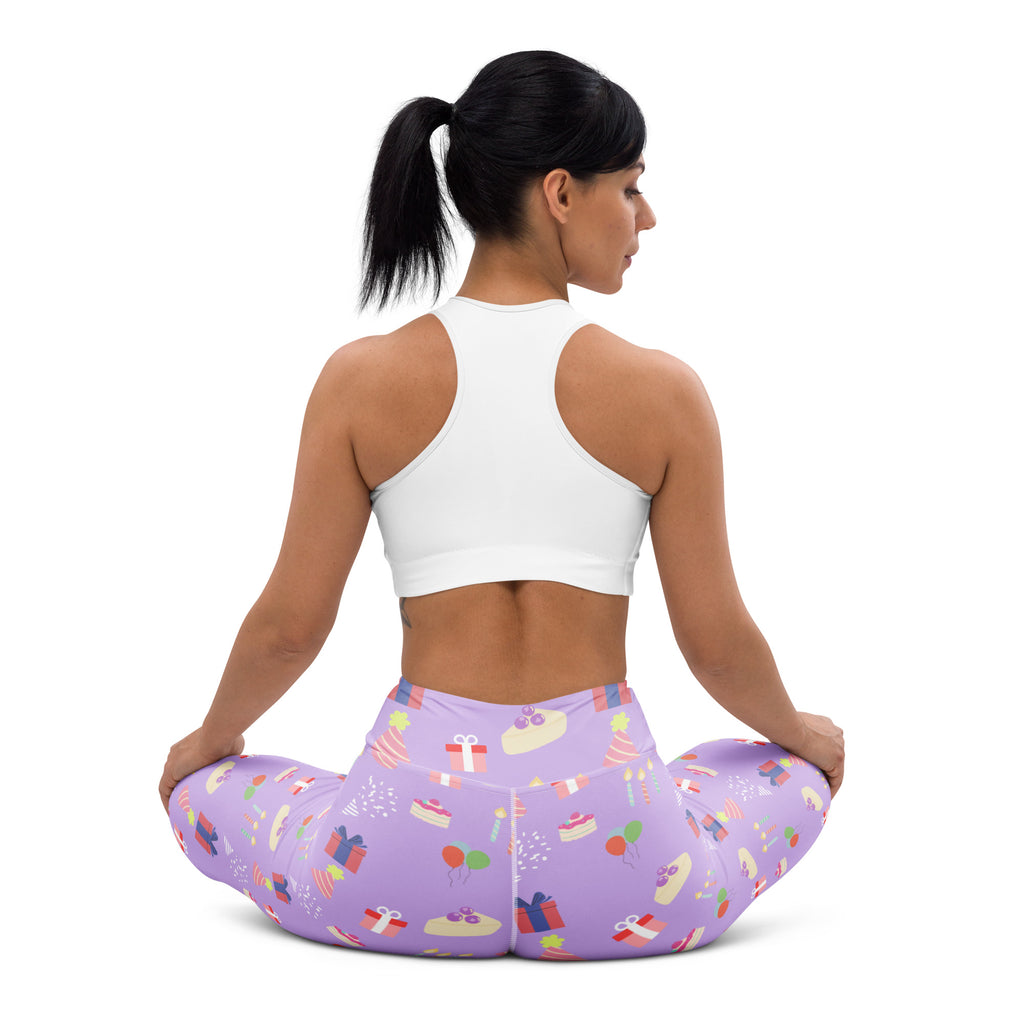 Women’s purple buttery soft yoga leggings with playful birthday cake gifts and balloons pattern