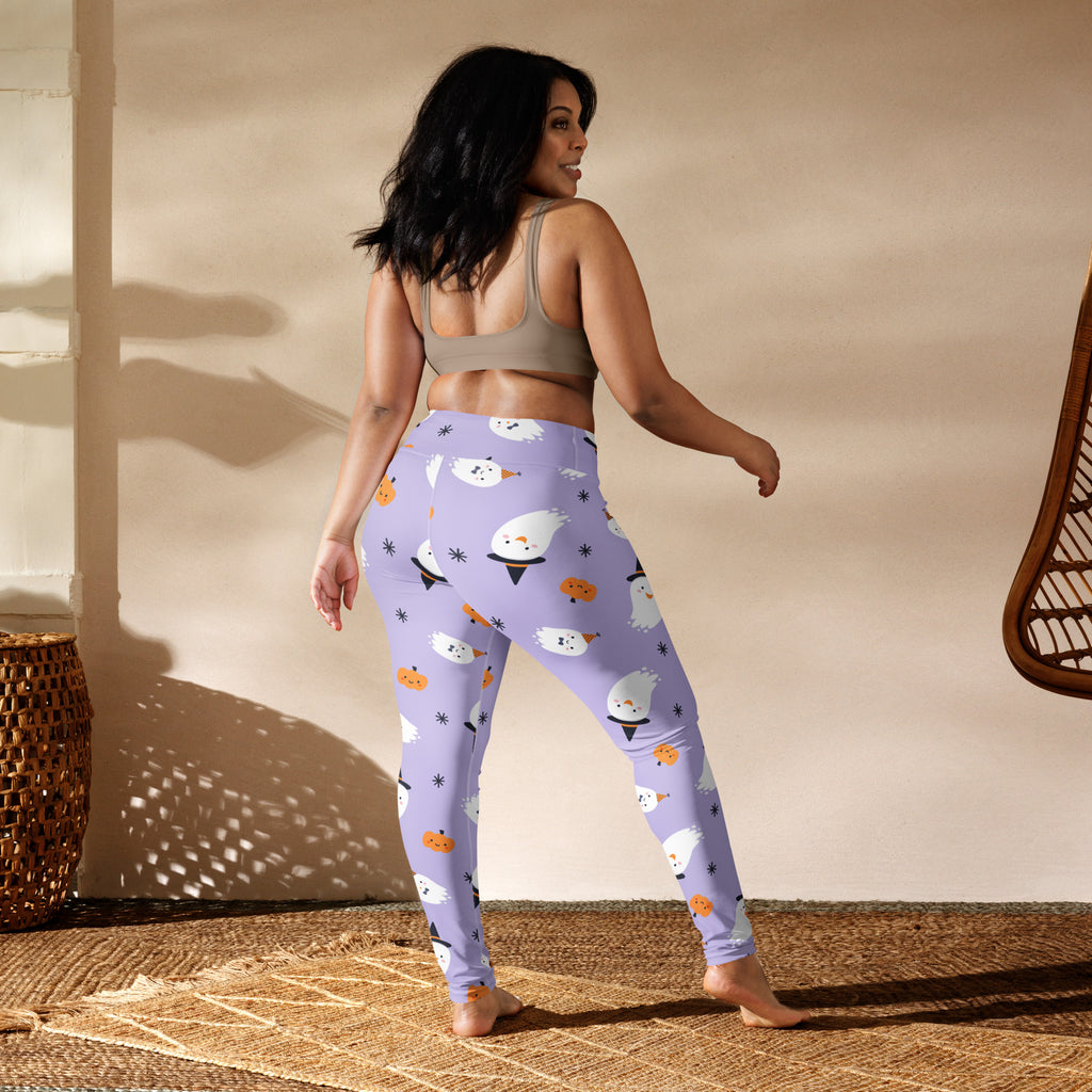 Lavender buttery soft women’s yoga leggings with playful halloween pattern of white ghosts and orange pumpkins