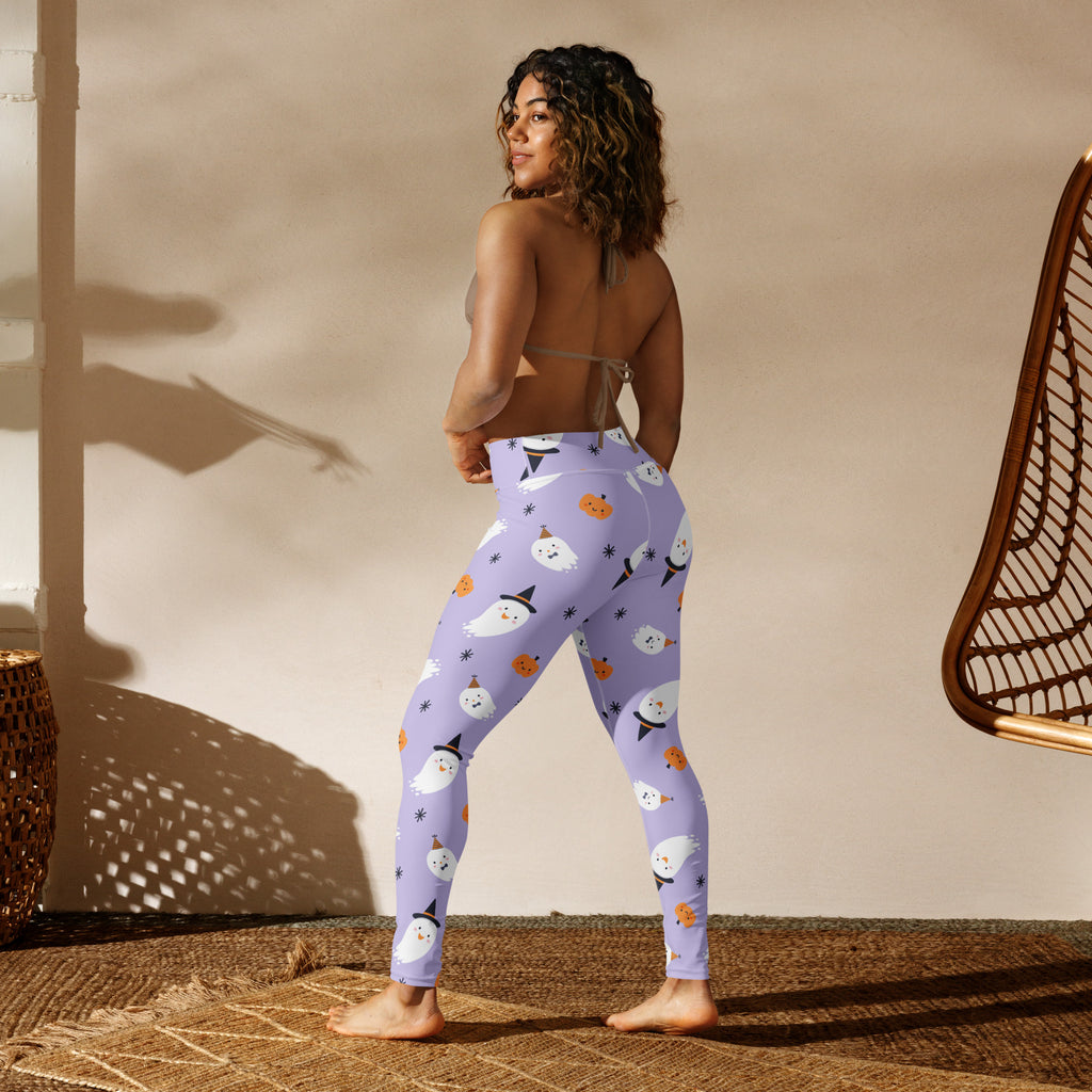 Women’s witch ghost buttery soft purple yoga leggings with playful white ghost hats and orange pumpkin pattern