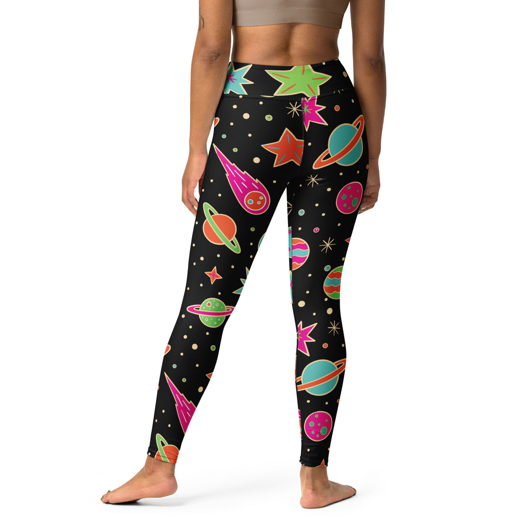 Women’s neon galaxy buttery soft yoga leggings in black with vibrant neon planets stars and comets design