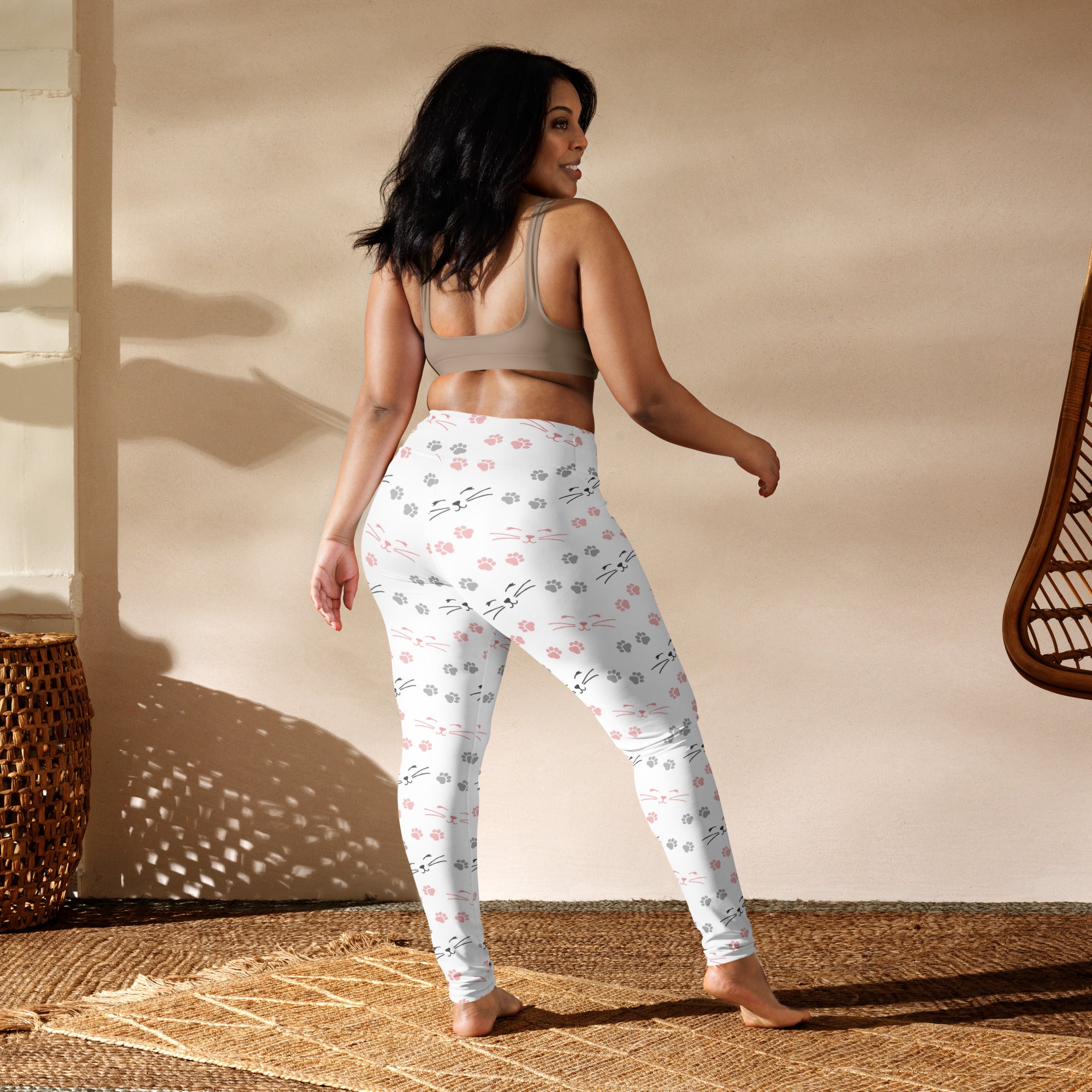 White buttery soft yoga leggings with playful pink and gray cat paw prints and whiskers pattern for women