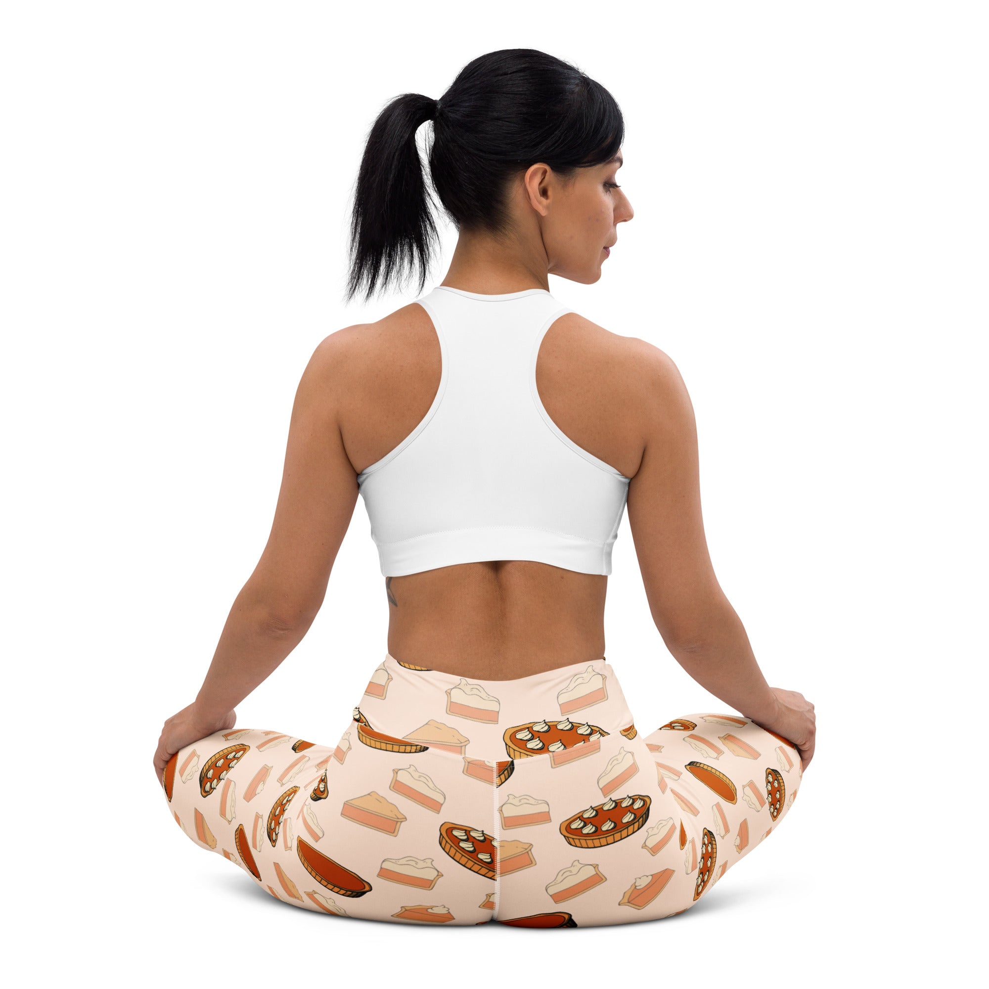 Beige women’s buttery soft yoga leggings with a playful pattern of assorted warm toned pies for Thanksgiving