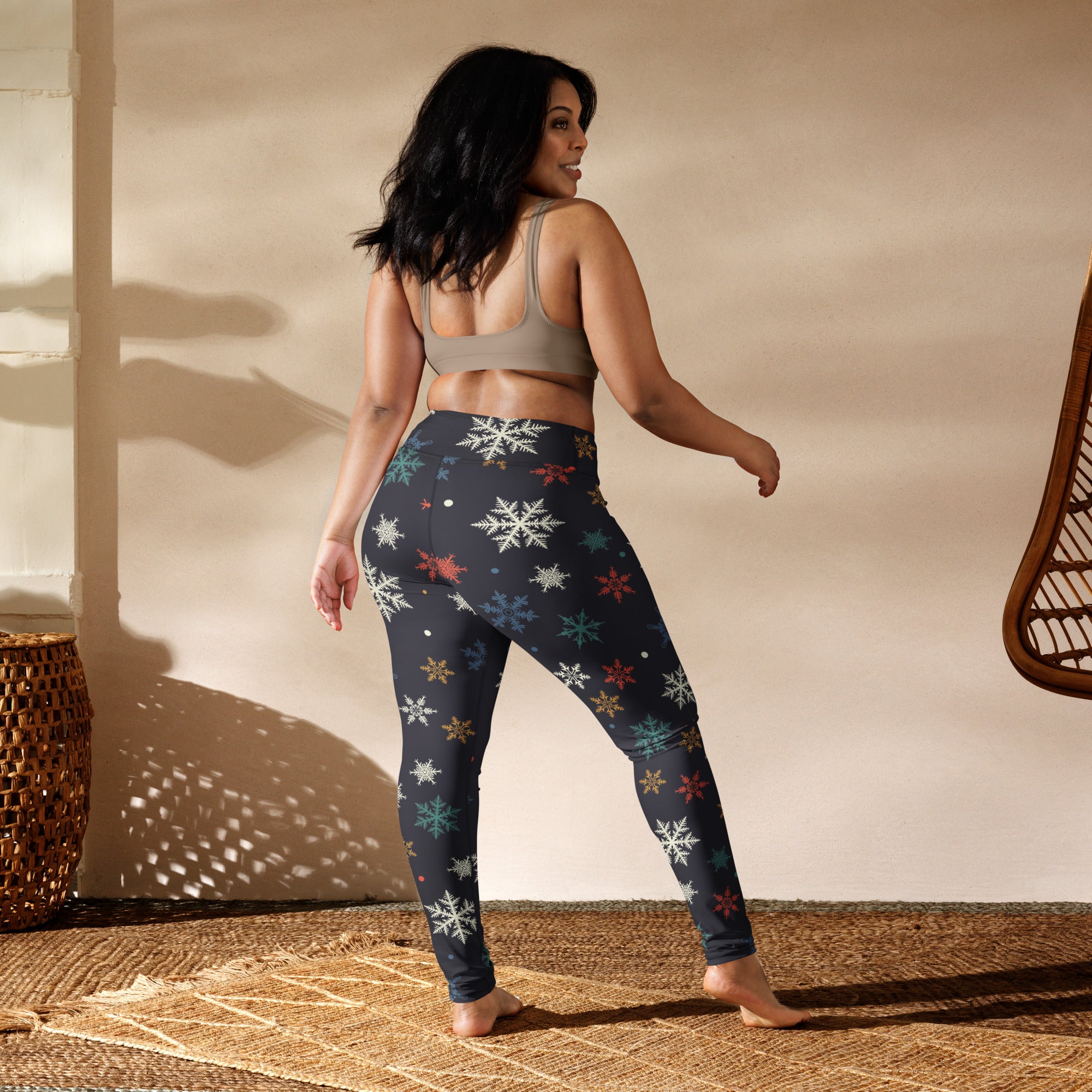 Women’s winter snowflake buttery soft yoga leggings in dark blue with multicolored festive snowflake pattern