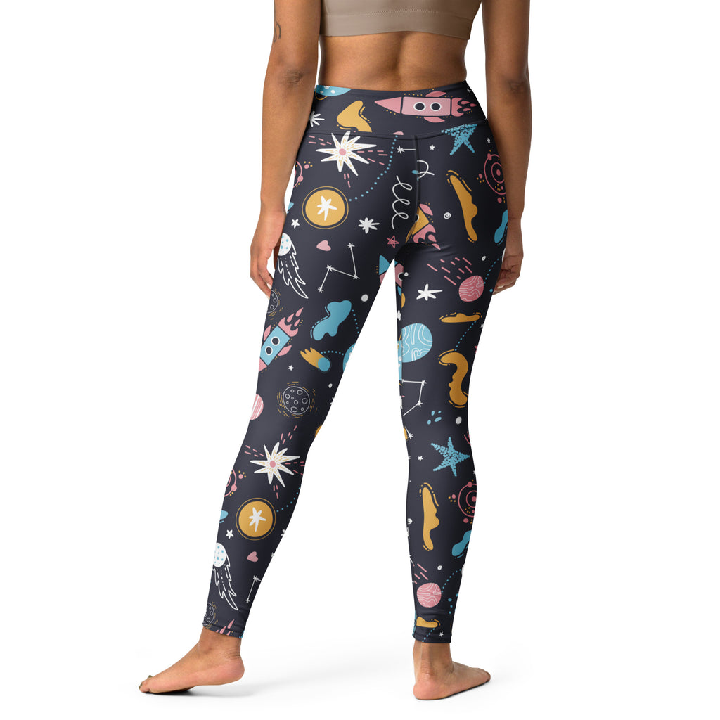 Women’s outer space buttery soft black yoga leggings with colorful pastel rockets planets stars and constellations