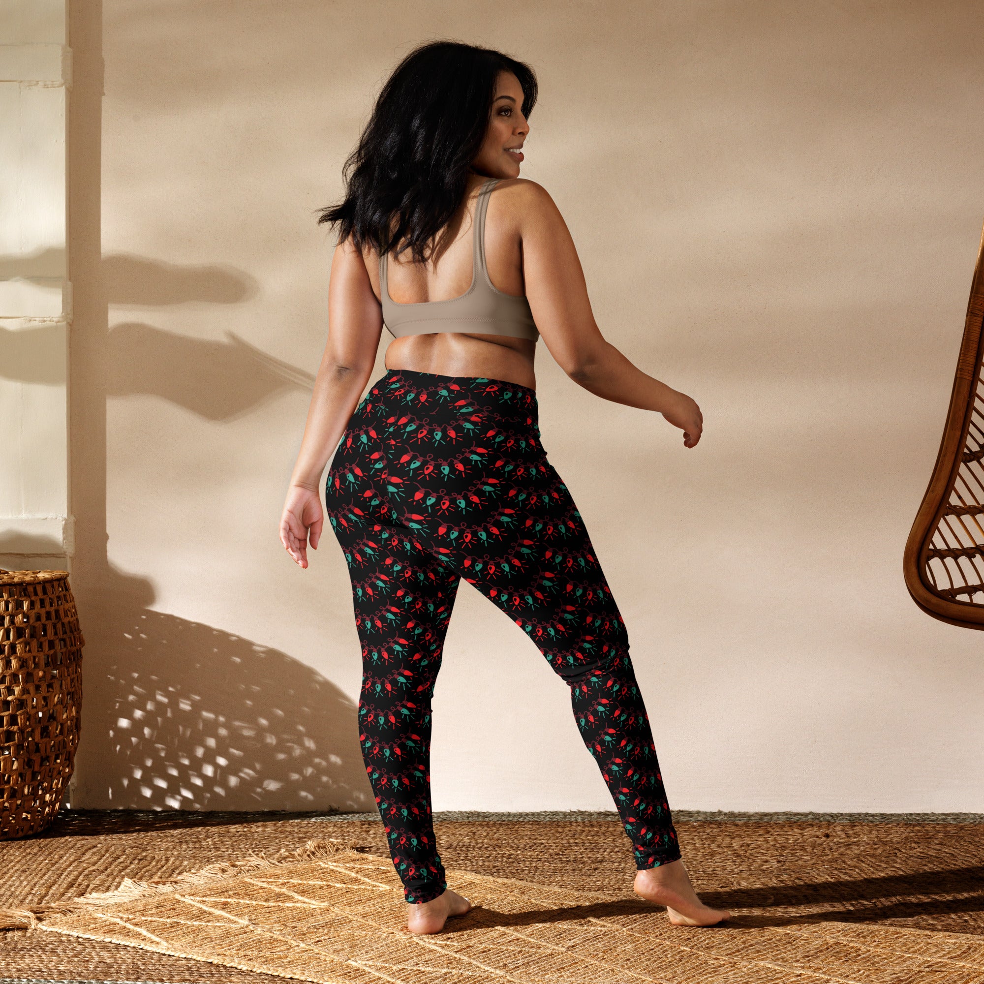 Women’s buttery soft black yoga leggings with vibrant red and green chili pepper pattern for christmas wear