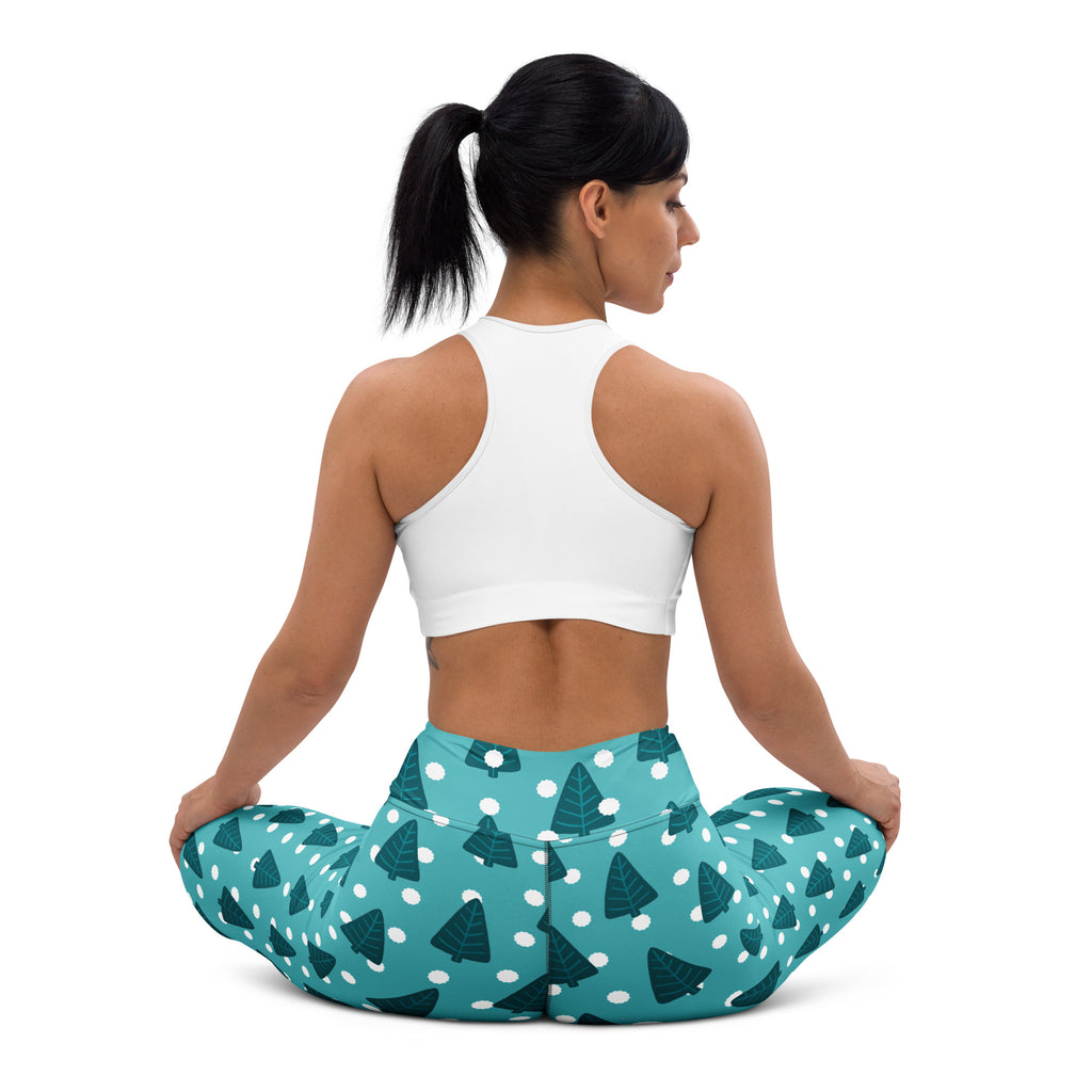 Women’s teal winter tree buttery soft yoga leggings featuring dark green pine tree and white polka dot pattern