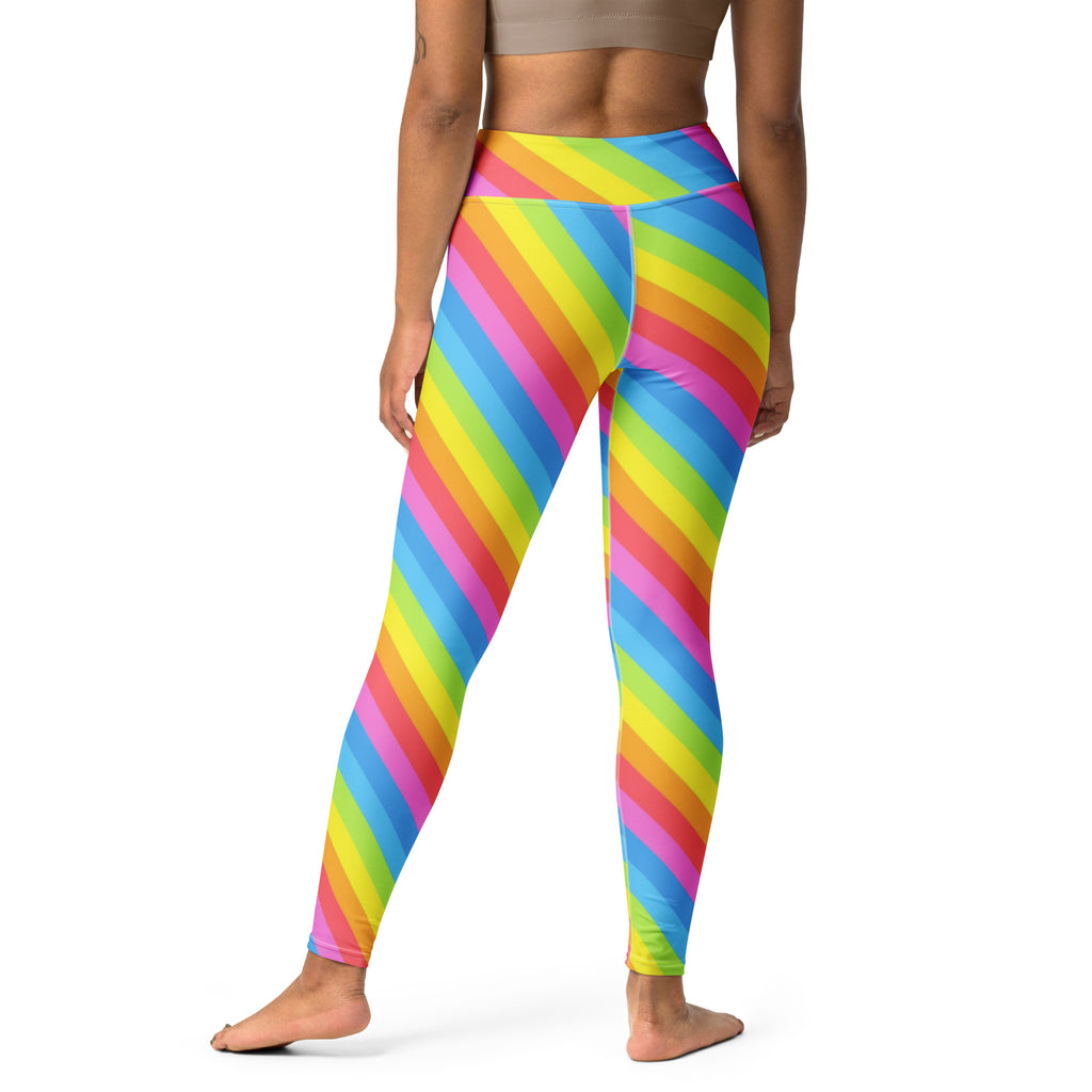 Women’s high waisted buttery soft yoga leggings with vibrant rainbow stripes in yellow blue pink and green quick drying