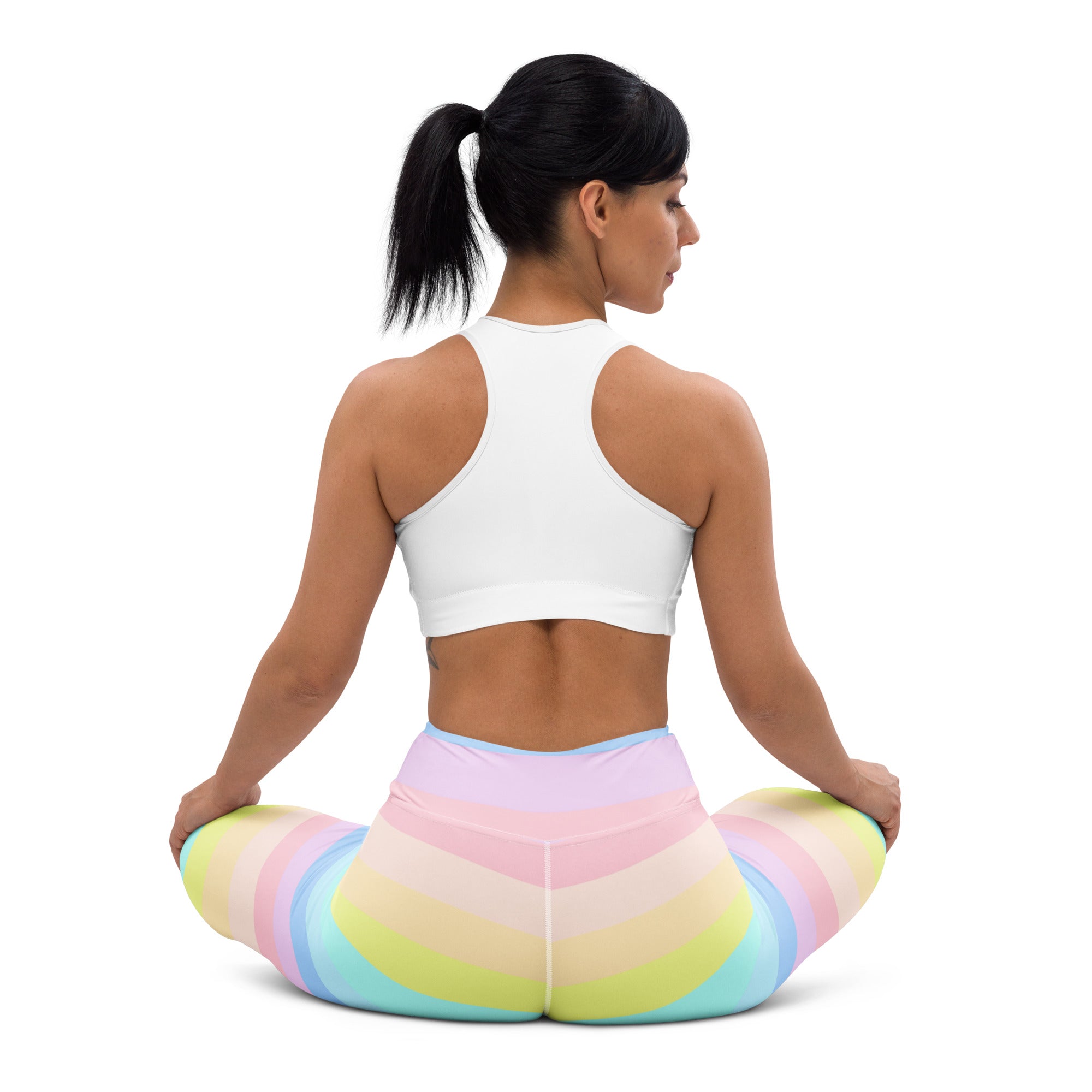 Women’s pastel rainbow stripe buttery soft high waisted yoga leggings shown from the back for quick drying comfort