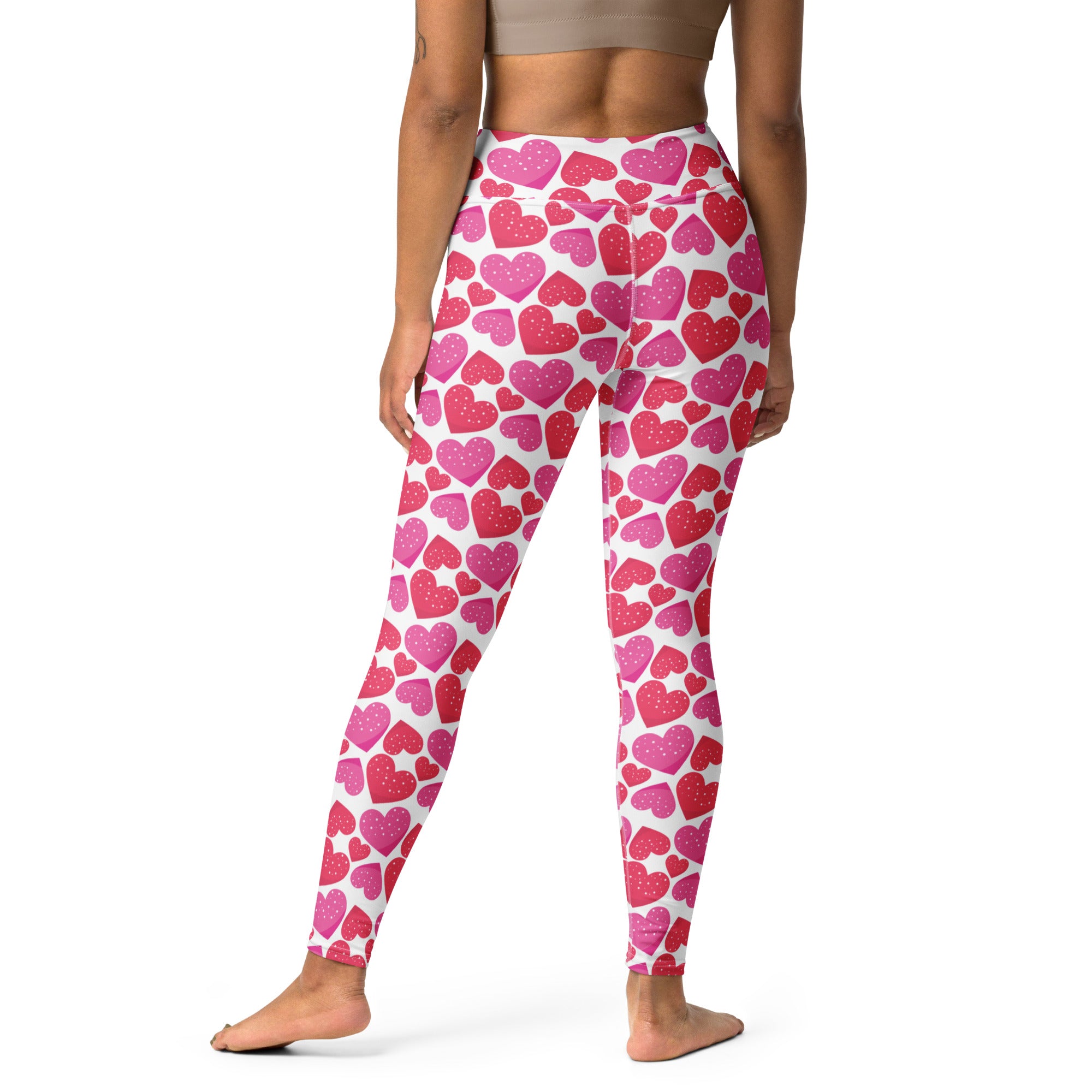 Women’s high waisted white yoga leggings with pink and red heart pattern buttery soft quick drying fabric