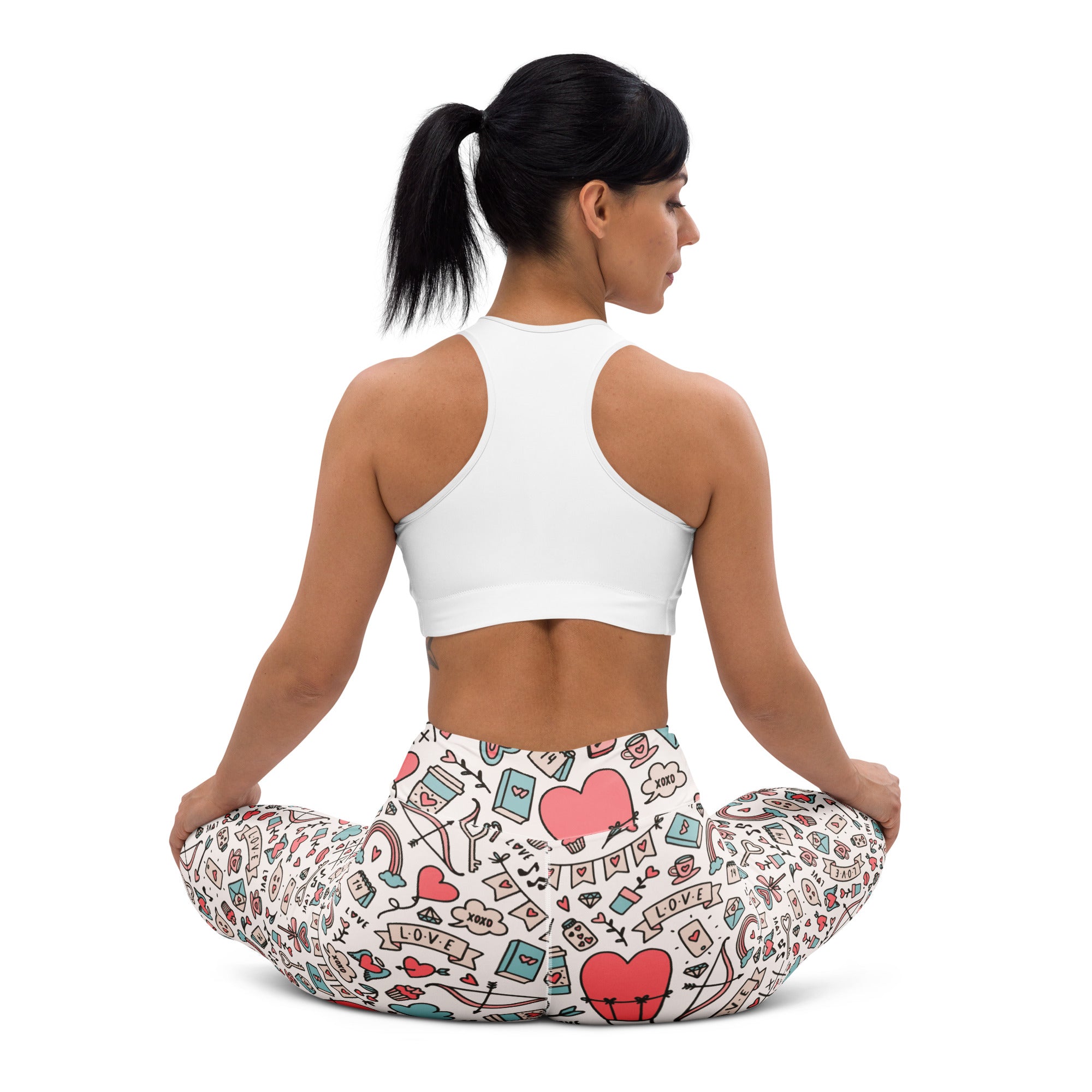 Women’s high waisted buttery soft white yoga leggings with pink hearts and love doodle pattern for valentine’s day