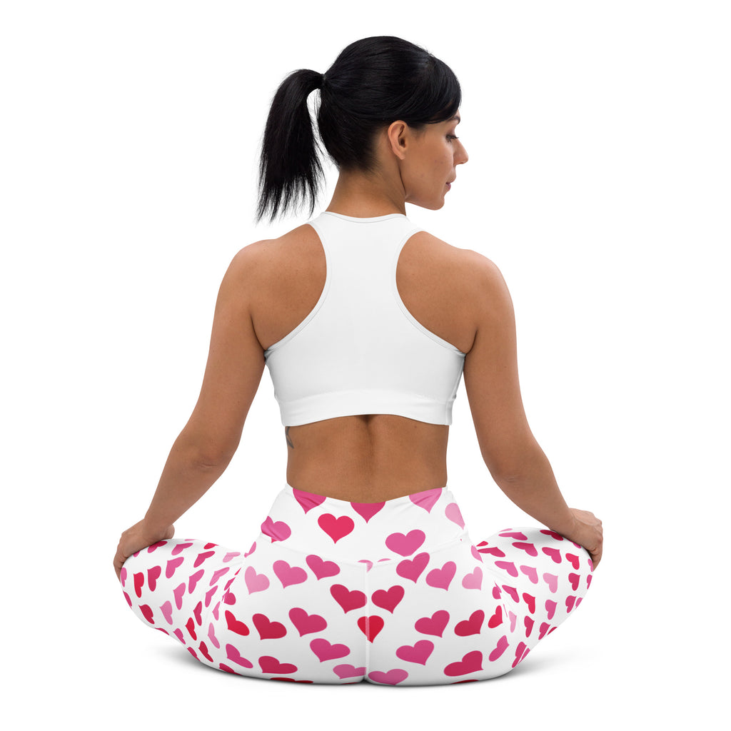 White women’s buttery soft yoga leggings with pink heart pattern high waisted and quick drying for comfort