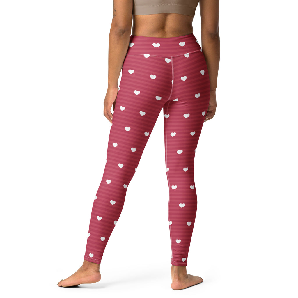 Women’s pink heart-patterned high-waisted leggings with subtle horizontal stripes buttery soft and quick drying