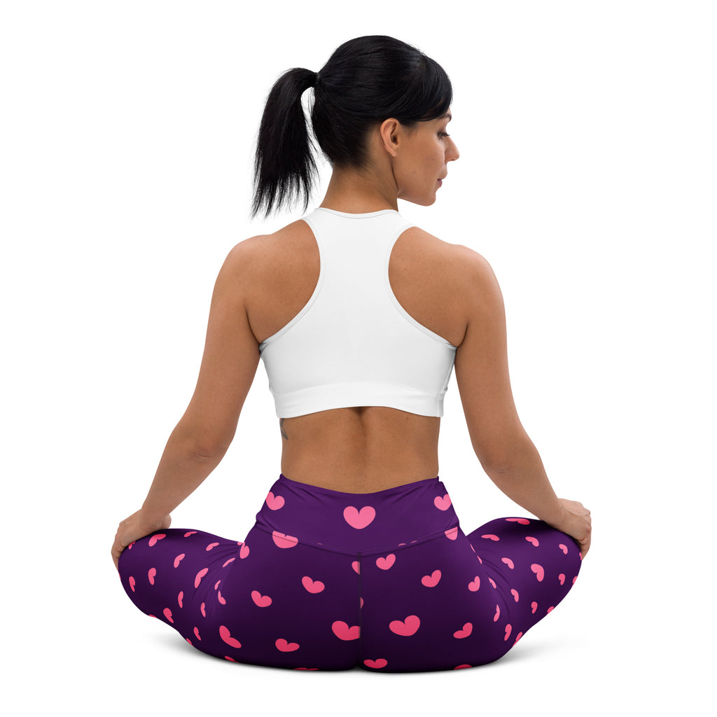Women’s purple high waisted buttery soft yoga leggings with pink heart pattern and quick drying fabric