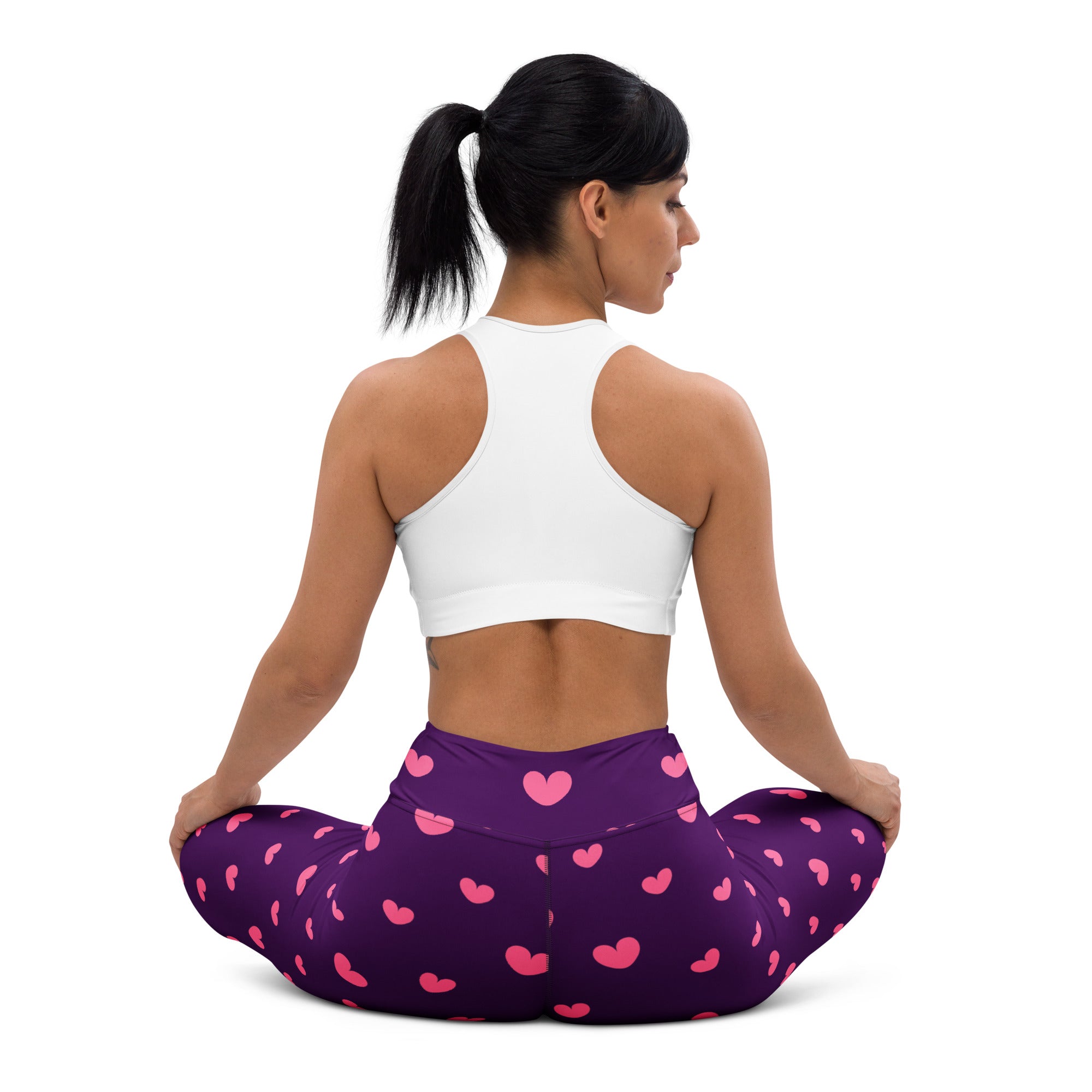 Women’s purple high waisted buttery soft yoga leggings with pink heart pattern and quick drying fabric