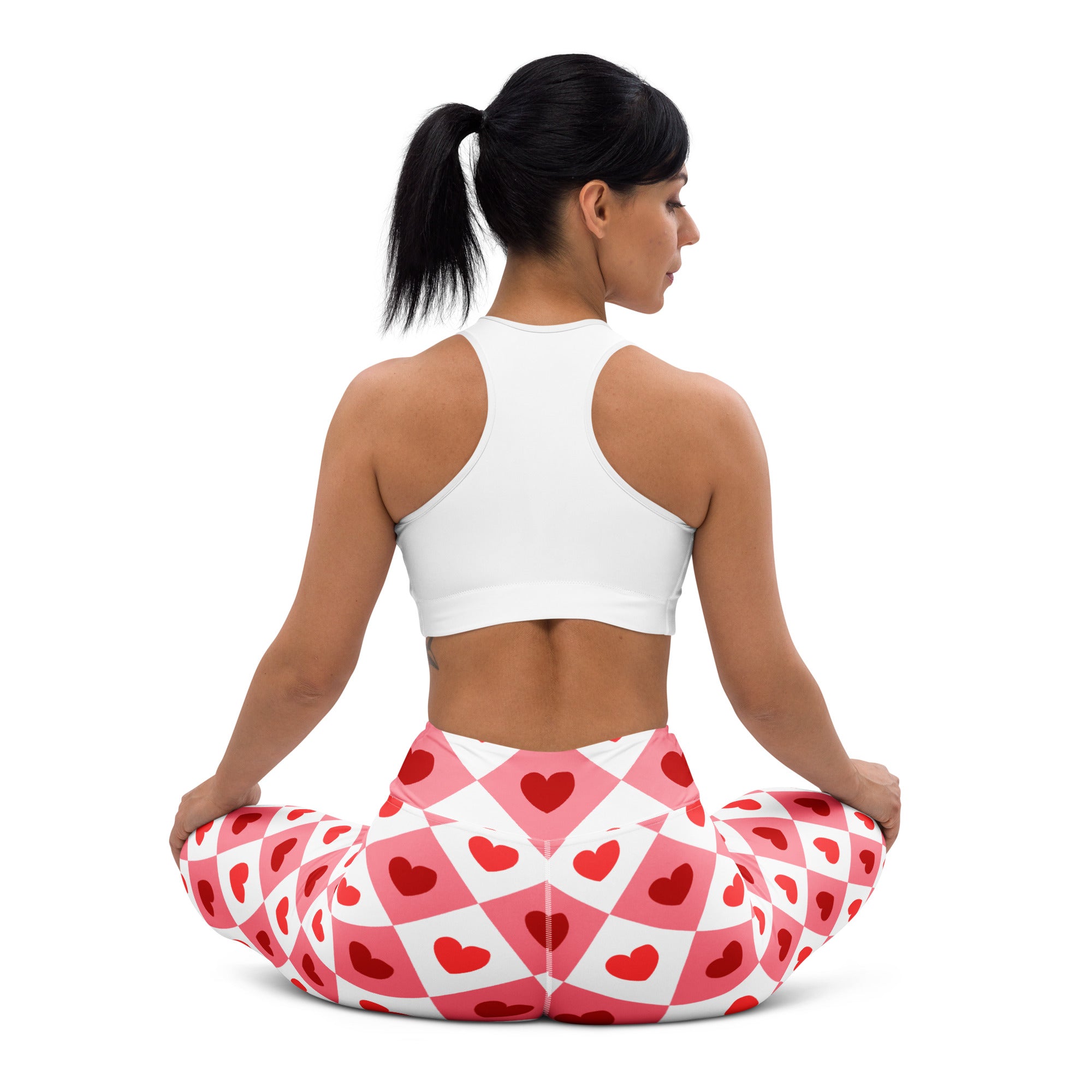 Women’s pink and white heart-patterned quick drying high waisted yoga leggings with buttery soft fabric and checkered design