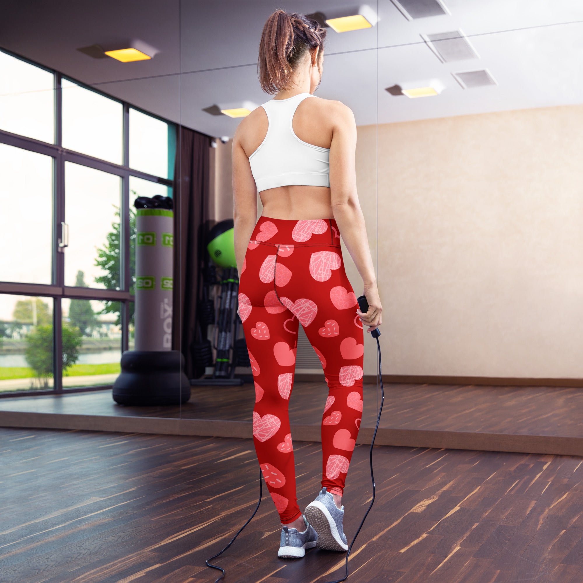 Women’s red heart pattern buttery soft high waisted yoga leggings with a snug form fitting design