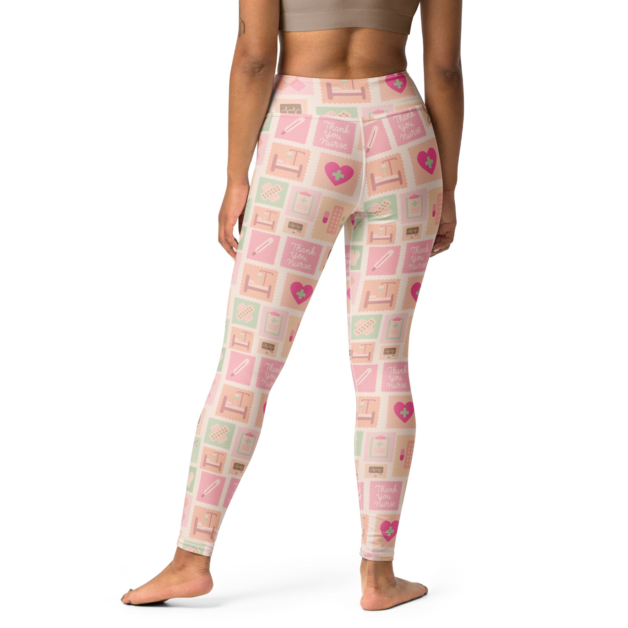 Women’s pink nurse icon buttery soft high waisted leggings with pink and mint makeup pattern and hearts on light background