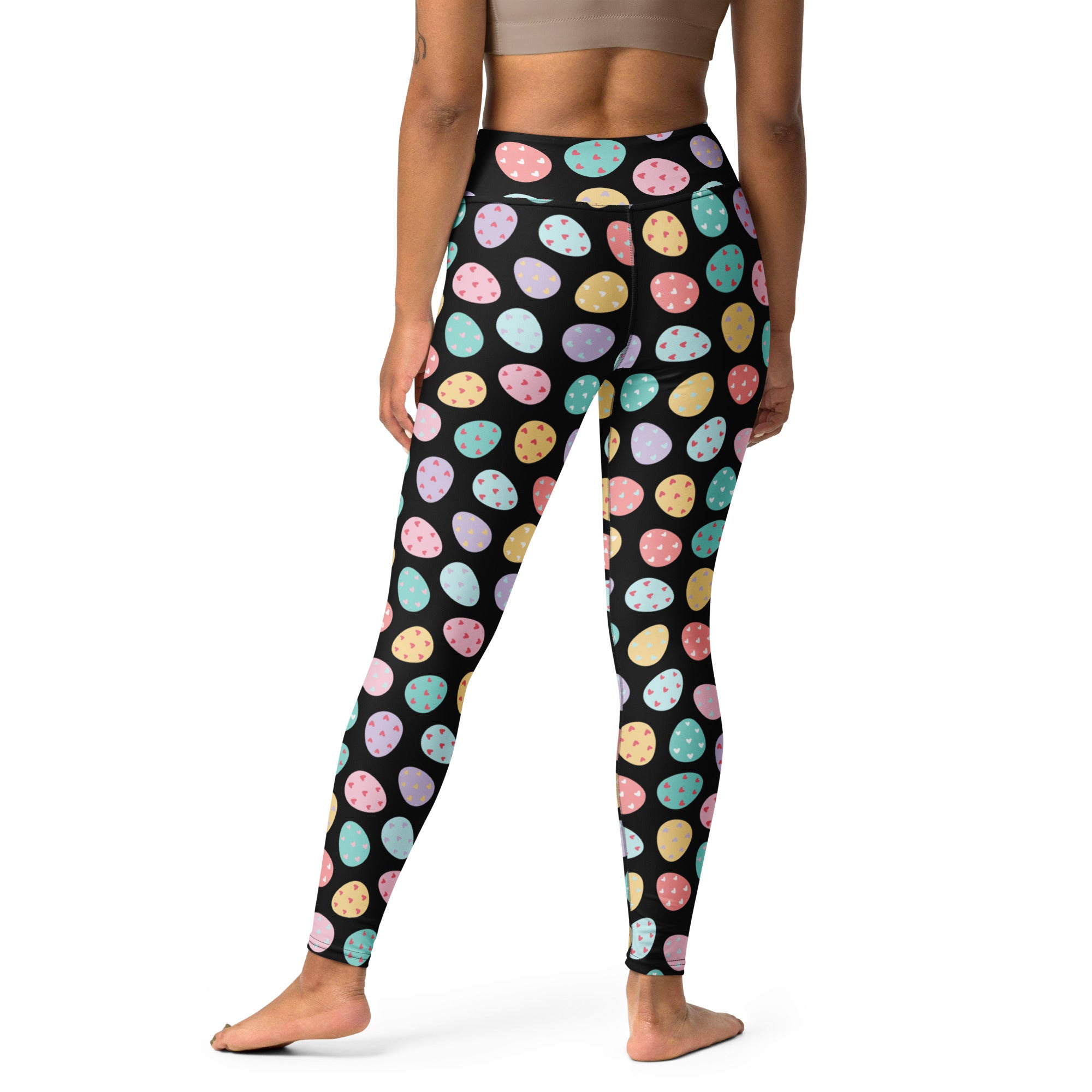 Women’s black high waisted buttery soft yoga leggings with colorful pastel easter egg pattern quick drying