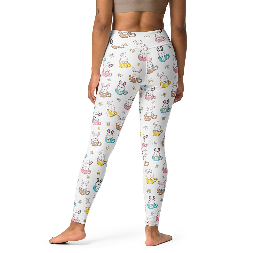 White women’s high waisted buttery soft yoga leggings with playful bunny teacup pattern and floral accents