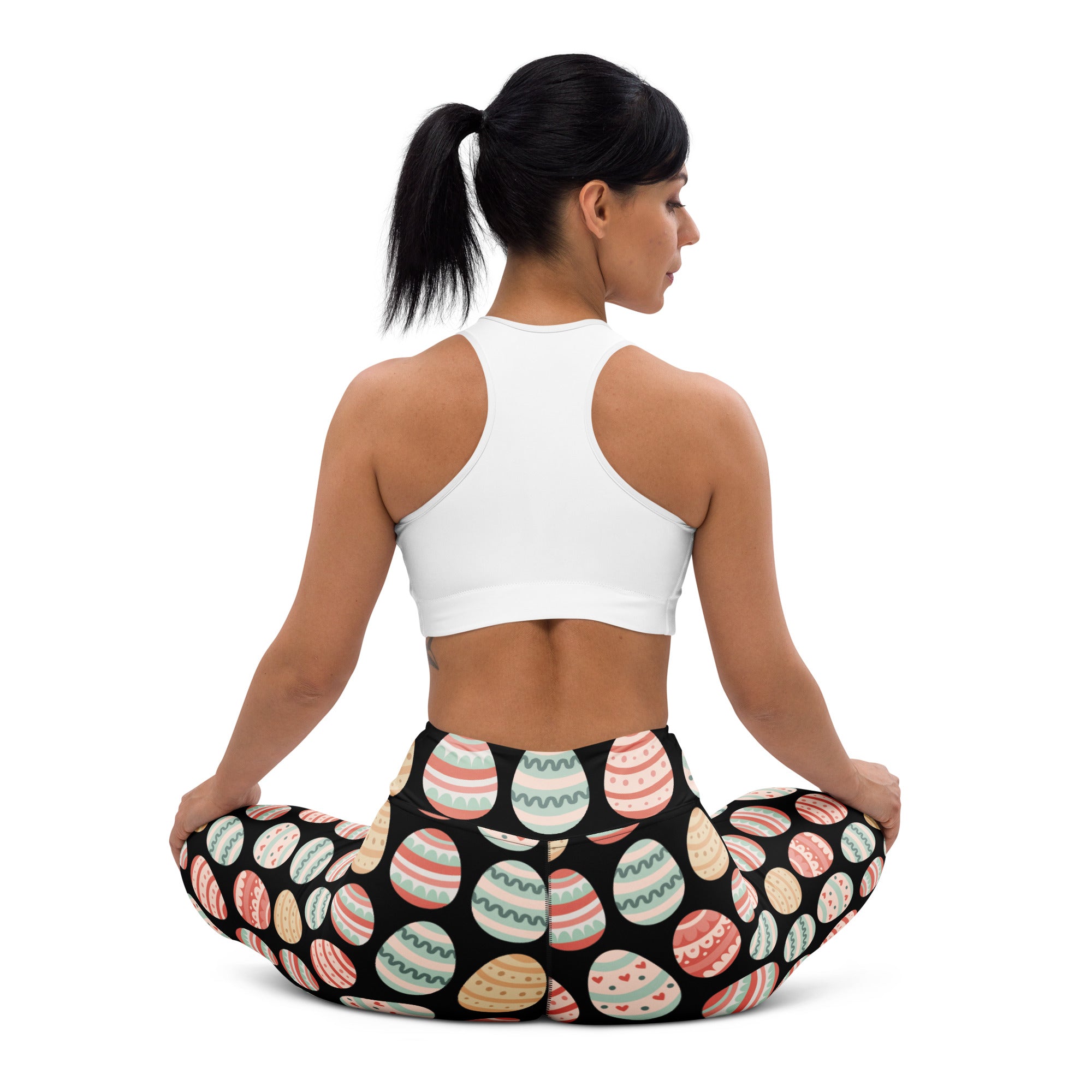 Women’s black buttery soft yoga leggings with colorful pastel striped easter egg pattern high waisted quick drying