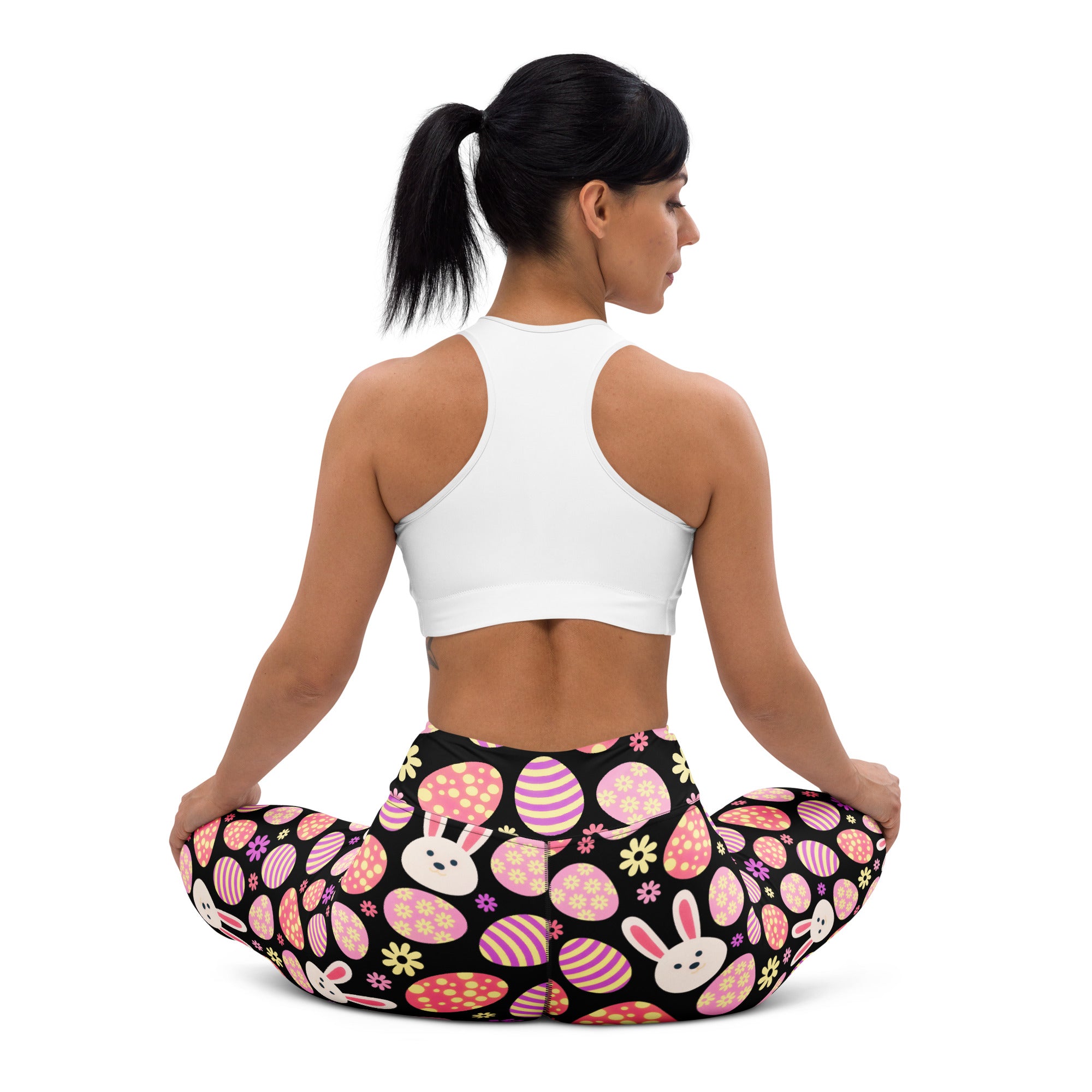 Women’s black buttery soft high waisted yoga leggings with pink purple striped easter eggs white bunnies and yellow flowers