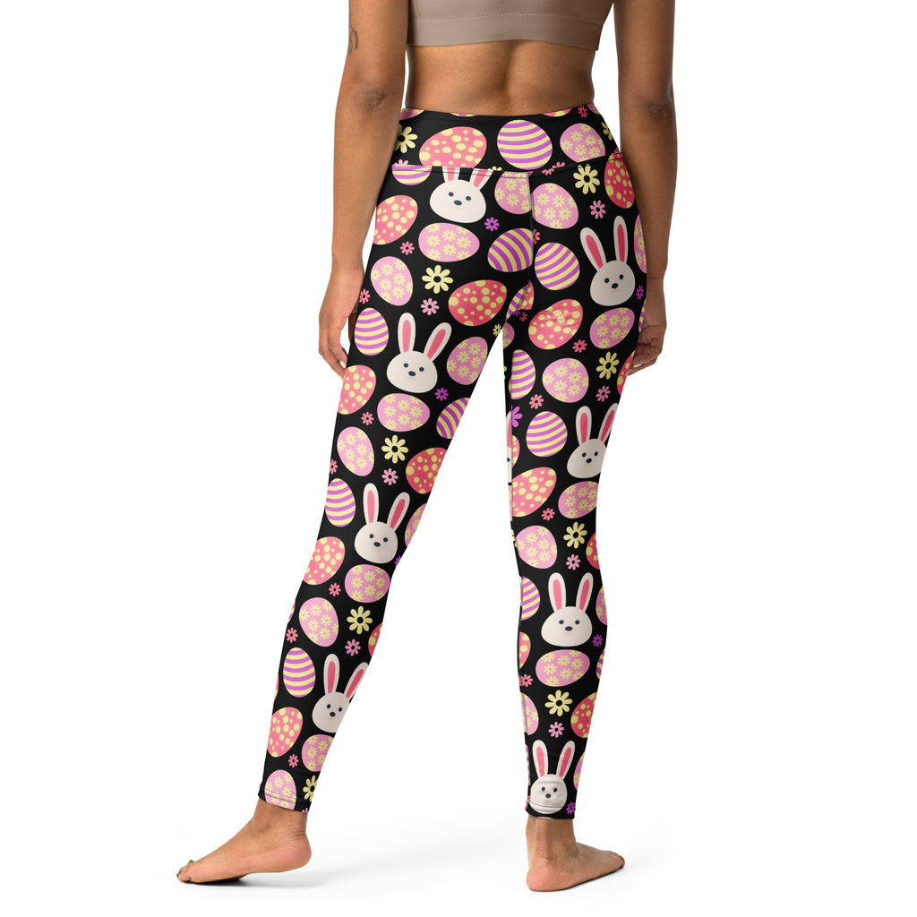 Women’s high waisted black buttery soft yoga leggings with pink purple easter eggs white bunny faces and yellow flowers