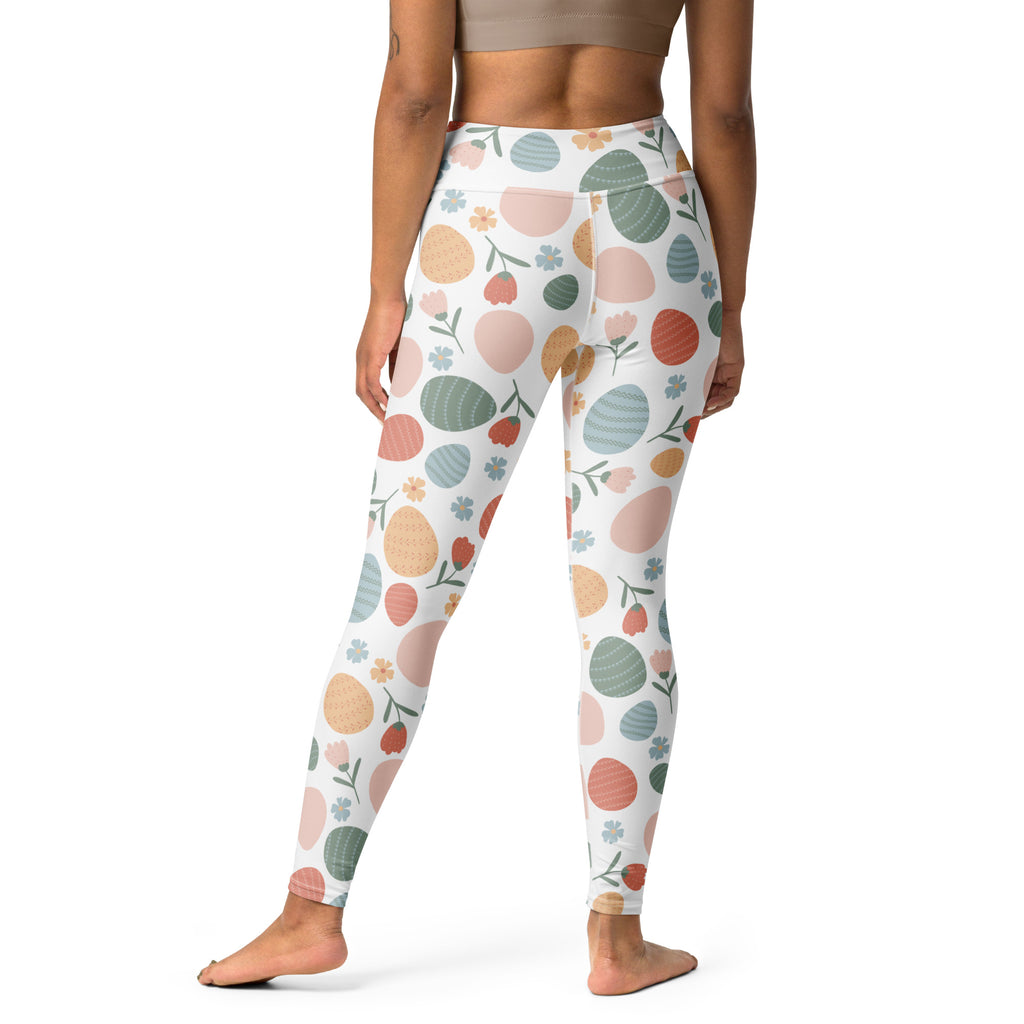 White women’s high waisted buttery soft yoga leggings with pastel easter egg and floral pattern quick drying