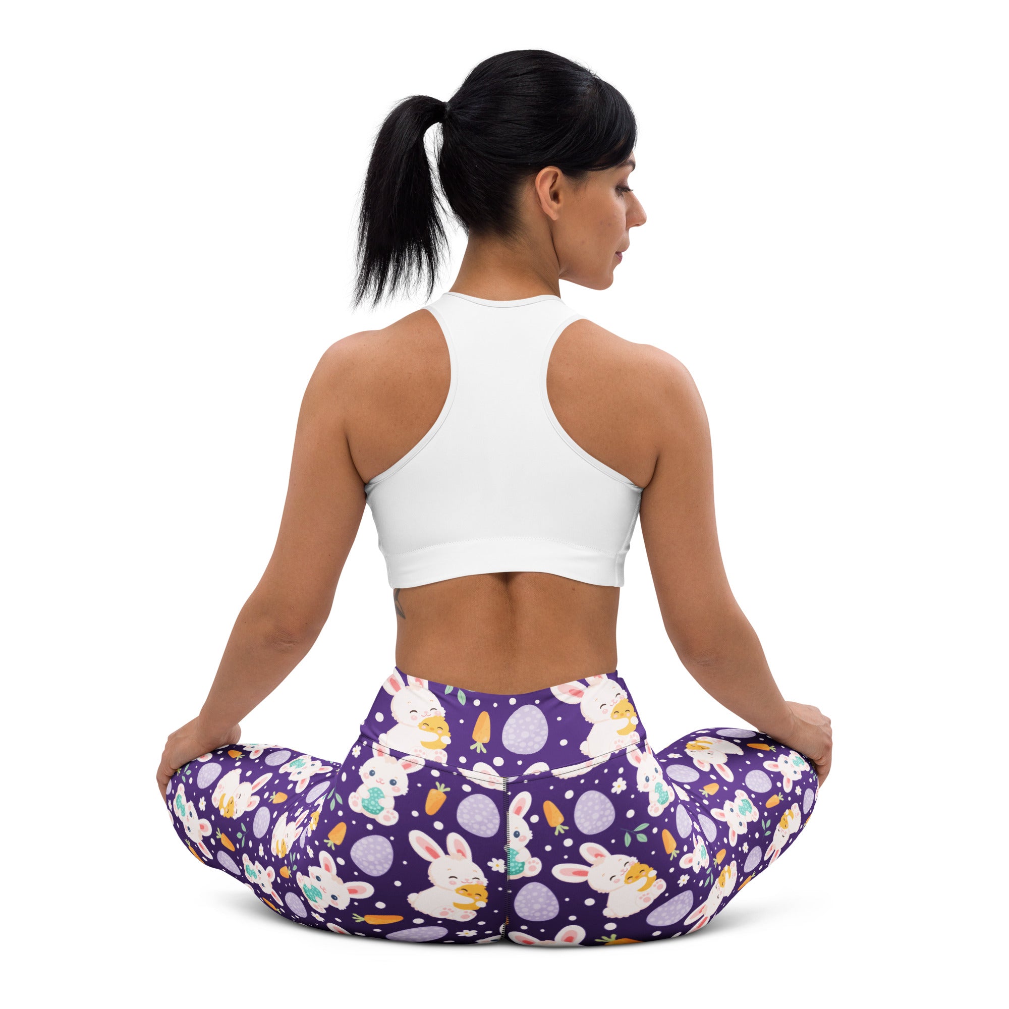 Women’s purple buttery soft high waisted yoga leggings with white bunnies carrots and pastel easter eggs pattern