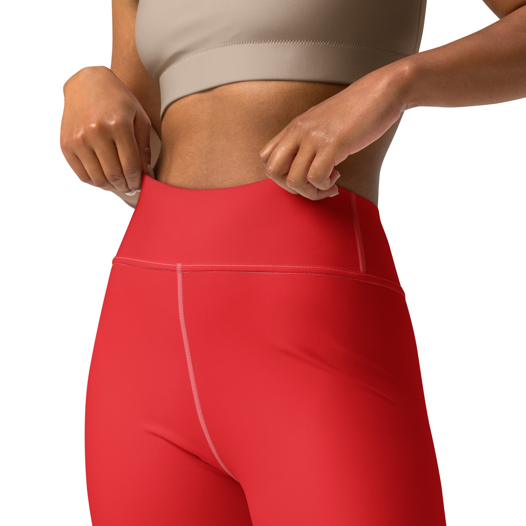 Women’s red buttery soft yoga leggings with high-waisted, snug fit and subtle white side seam stitching