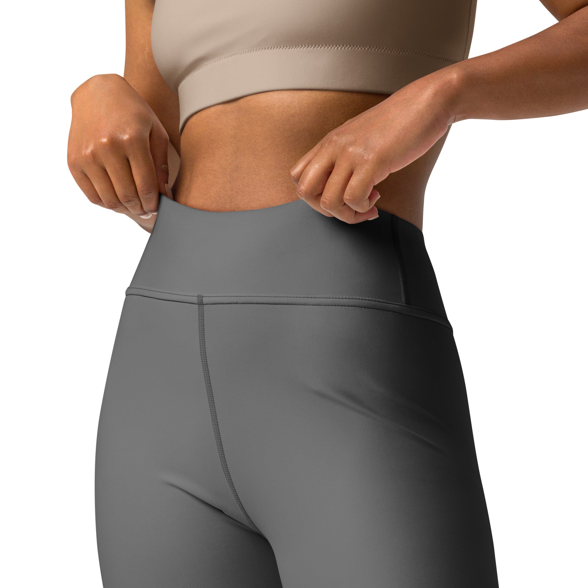 Women’s gray buttery soft yoga leggings in high-waisted style with smooth stretchy fabric and subtle seam detailing
