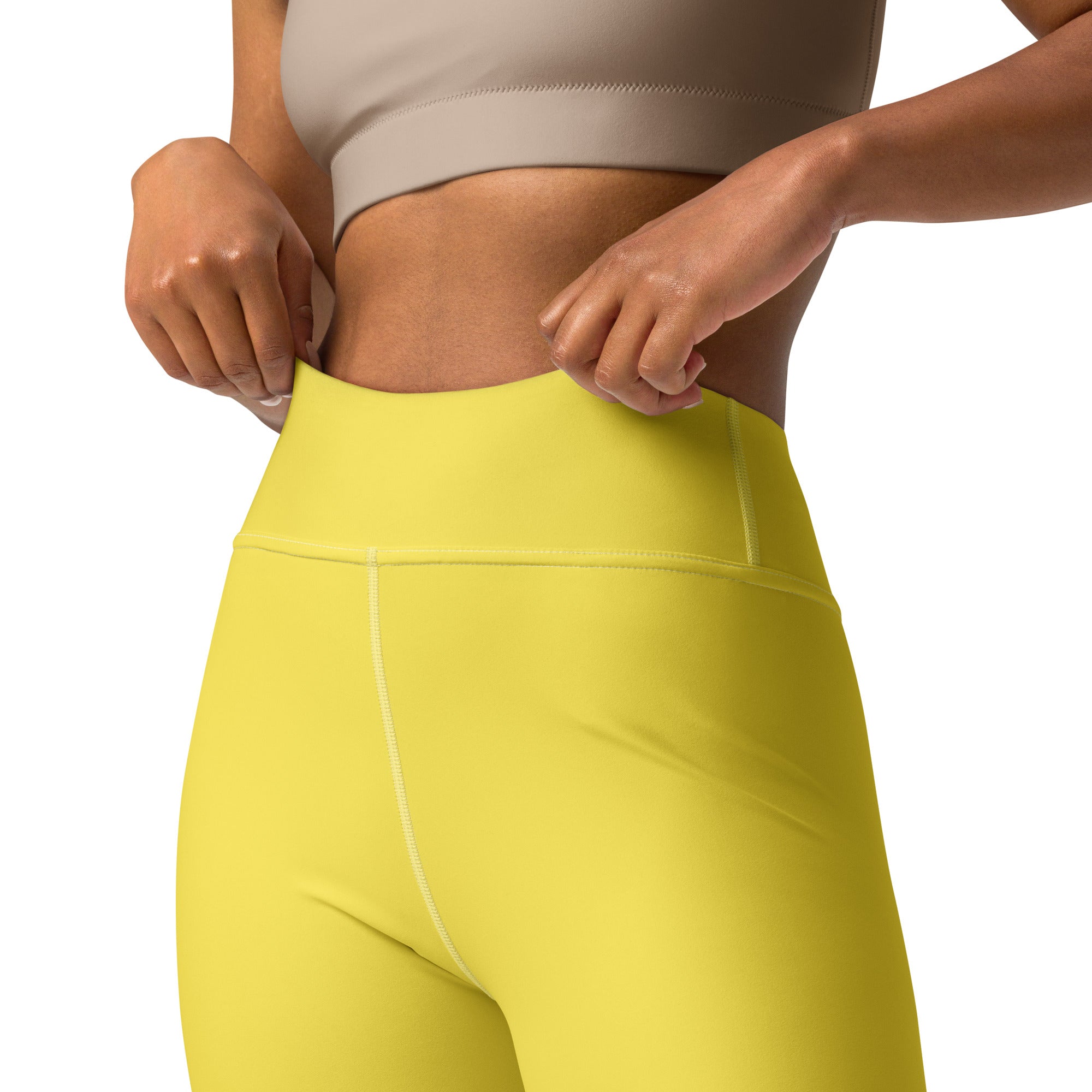Women’s yellow buttery soft yoga leggings with high waist, smooth stretchy fabric, and subtle white side stitching