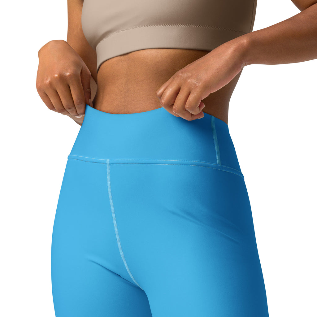 Women’s sky blue high-waisted buttery soft yoga leggings with smooth stretchy fabric and subtle white seam stitching