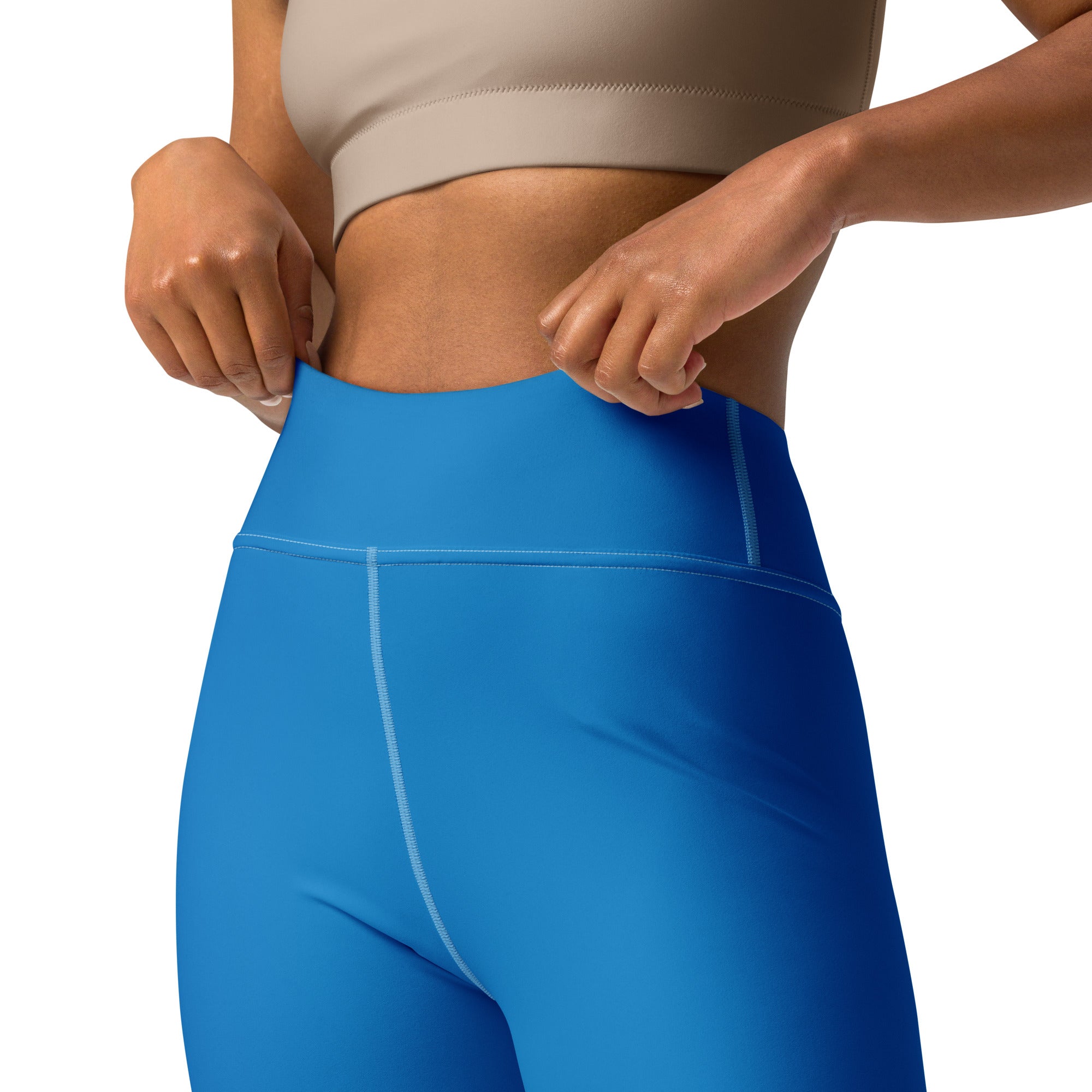Women’s royal blue buttery soft yoga leggings with bright blue high-waist and subtle light-blue stitching
