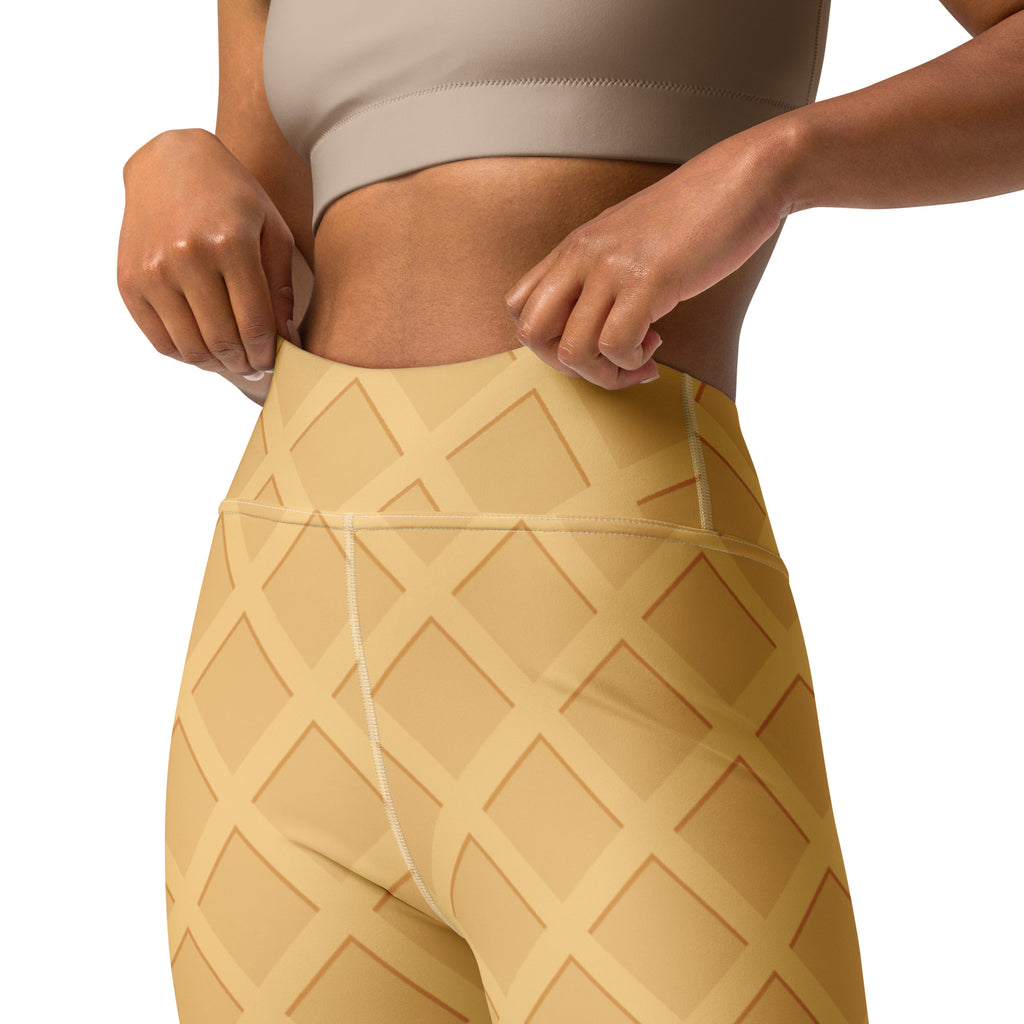 Beige high-waisted buttery soft yoga leggings with a waffle ice cream cone pattern for women