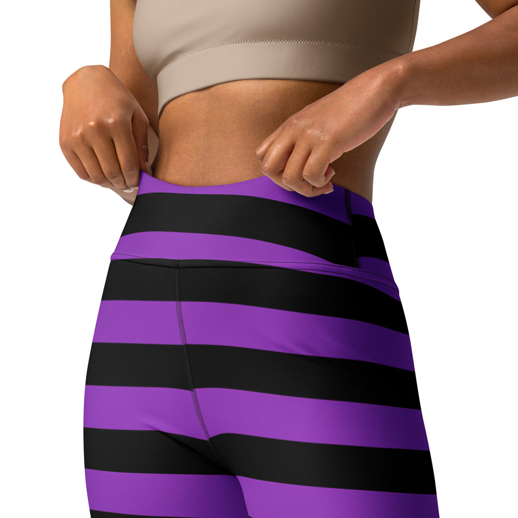 Women’s purple and black striped high-waisted buttery soft yoga leggings for halloween use