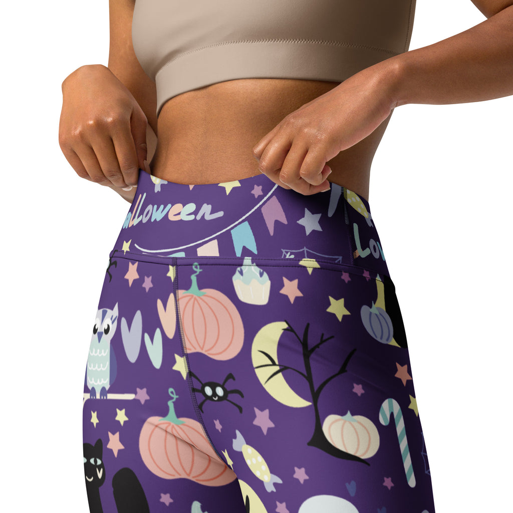 Women’s spooky halloween buttery soft purple high-waisted leggings with pumpkins owls spiders and candy canes on stretchy fabric