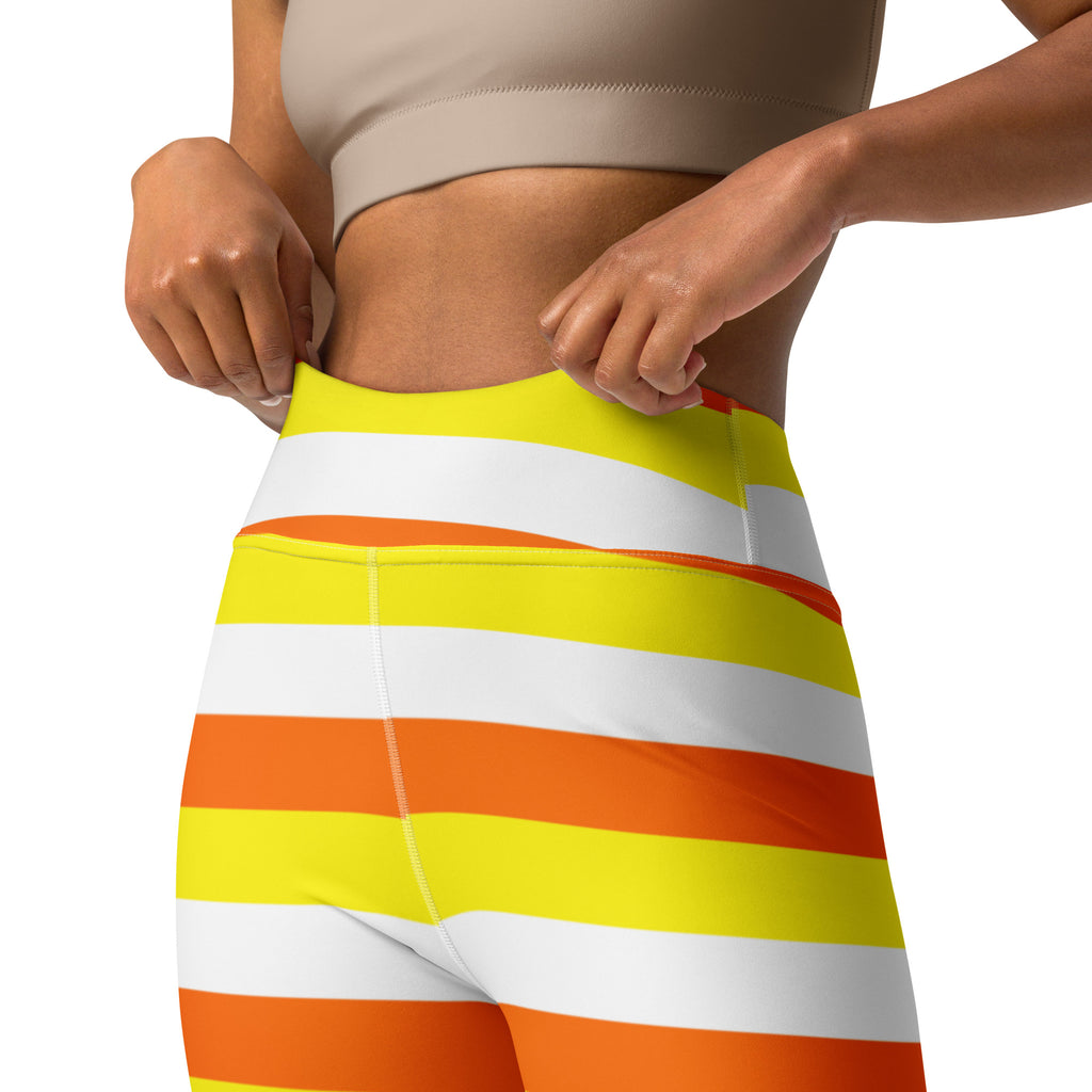Bright yellow and orange striped high-waisted buttery soft yoga leggings with white accents for women
