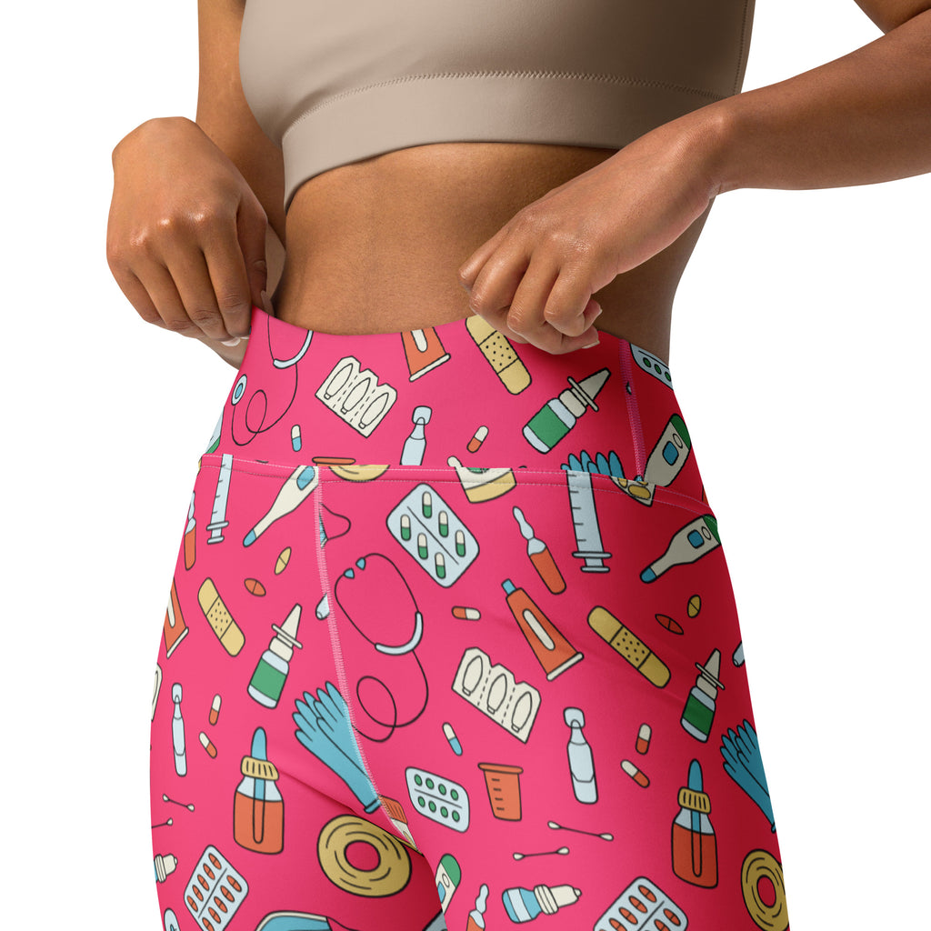 Bright pink high-waisted buttery soft yoga leggings with nurse themed cartoon medical supplies pattern