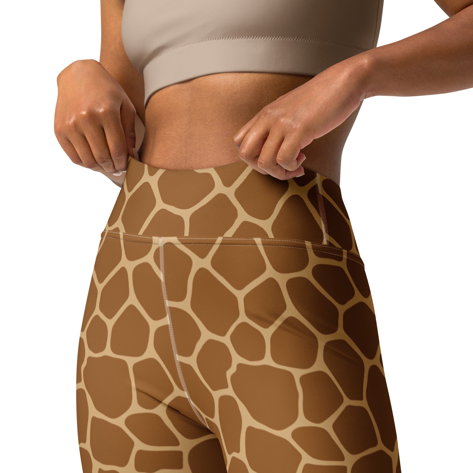 High-waisted women’s giraffe print yoga leggings in stretchy buttery soft fabric with tan and brown patches