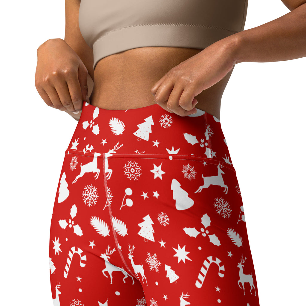 Women’s red christmas buttery soft high-waisted leggings with white snowflake reindeer candy cane and holly patterns