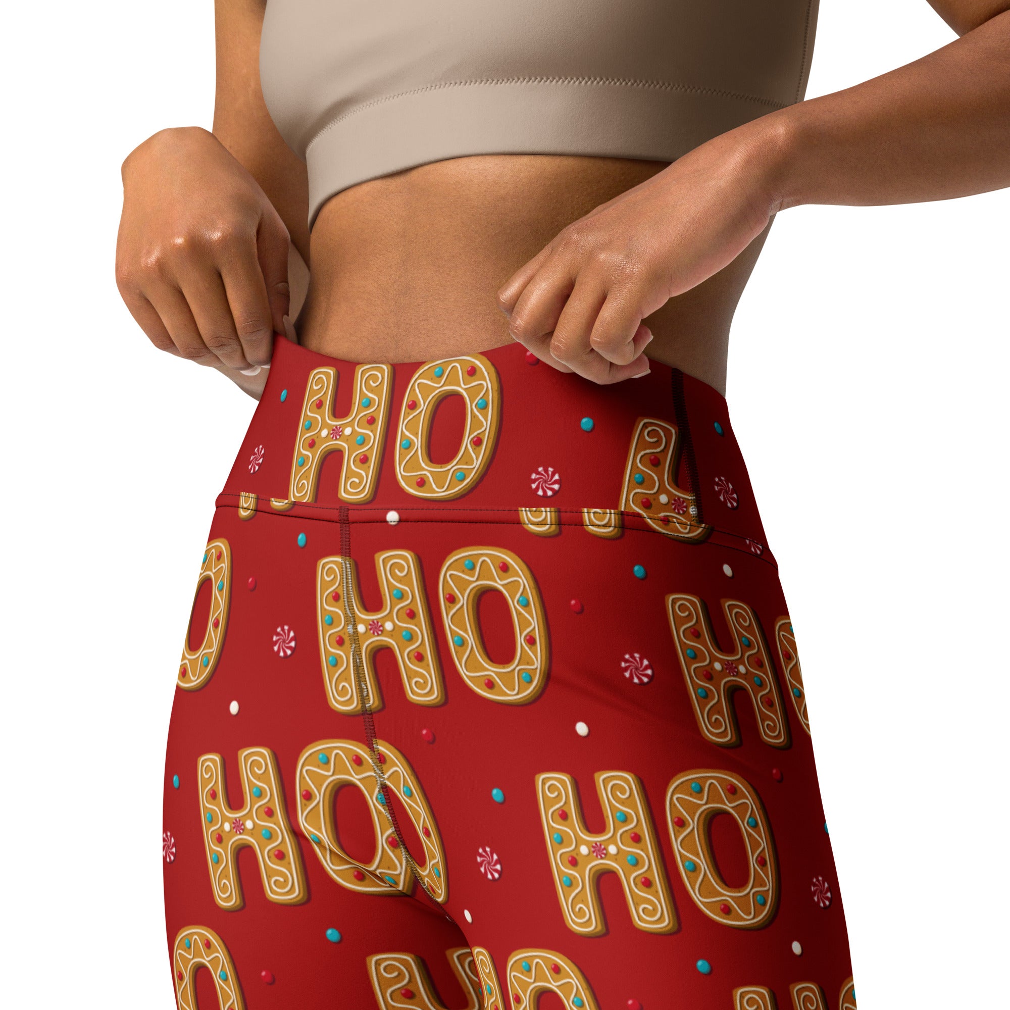 Red high-waisted buttery soft women’s yoga leggings with festive ho ho ho gingerbread cookie pattern and icing details