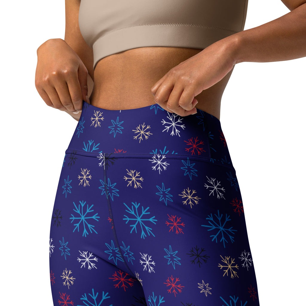 Women’s navy buttery soft high-waisted yoga leggings with vibrant white teal red and black snowflake pattern