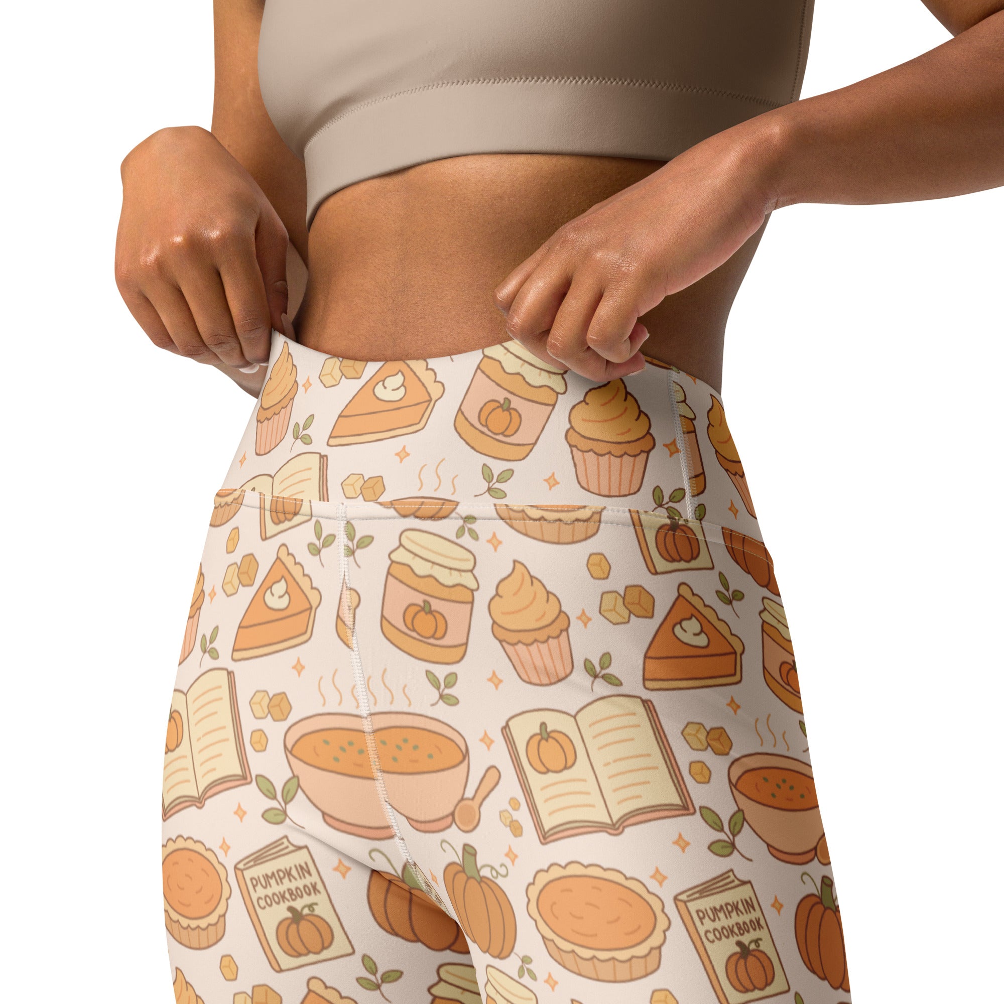 Cream-colored high-waisted buttery soft yoga leggings with a playful autumn pumpkin pie pattern for women